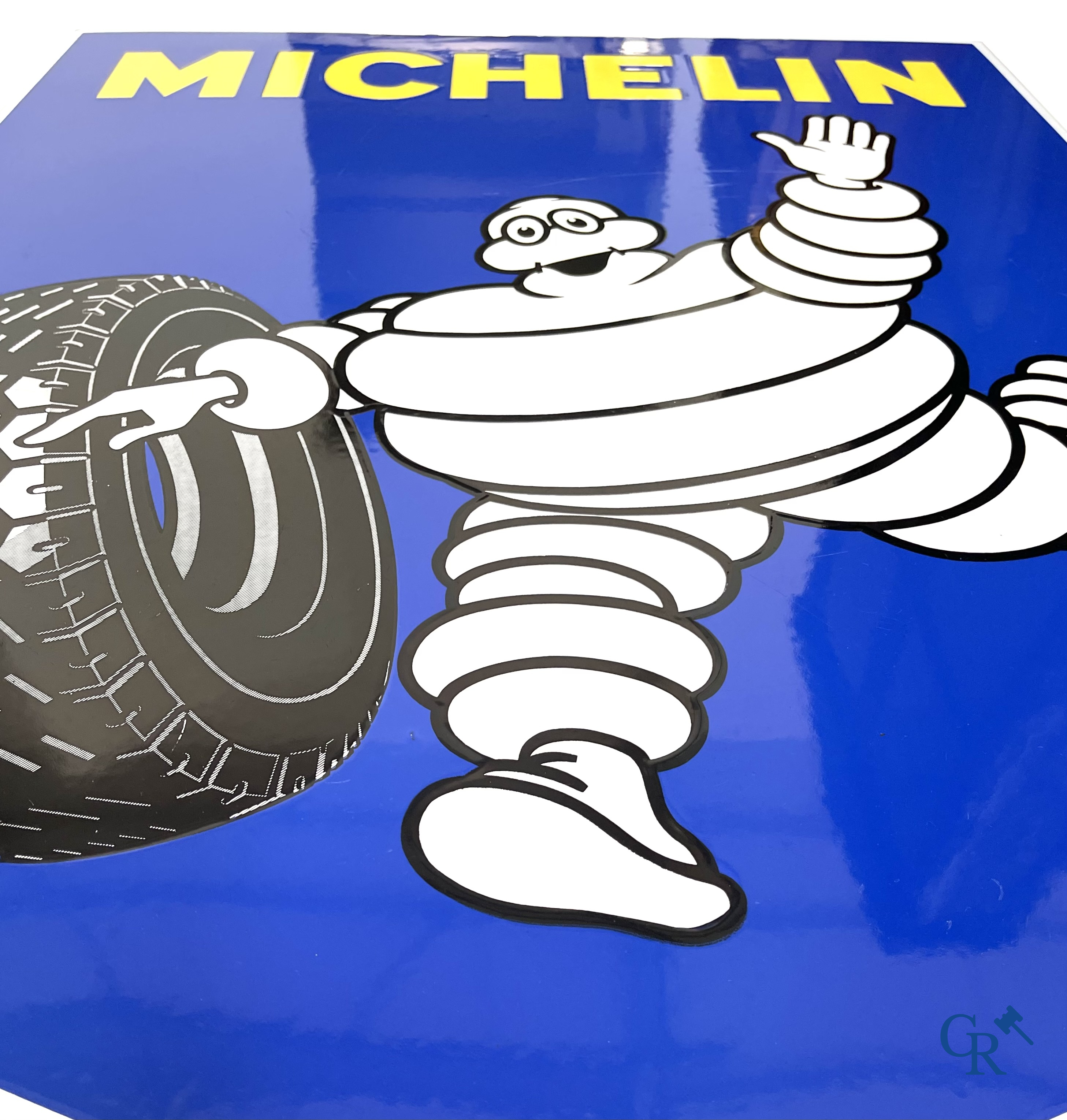 Michelin, Large enamel advertising sign of the running Bibendum with tire. Emaillerie Alsacienne Strasbourg.