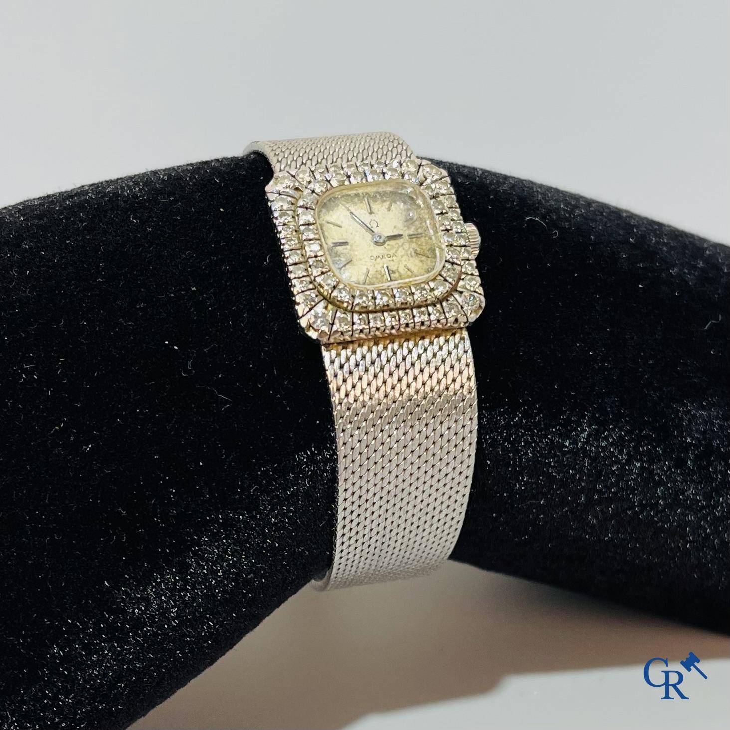 Watches, Swiss work, Omega ladies wristwatch in white gold 750°/00 set with small diamonds.