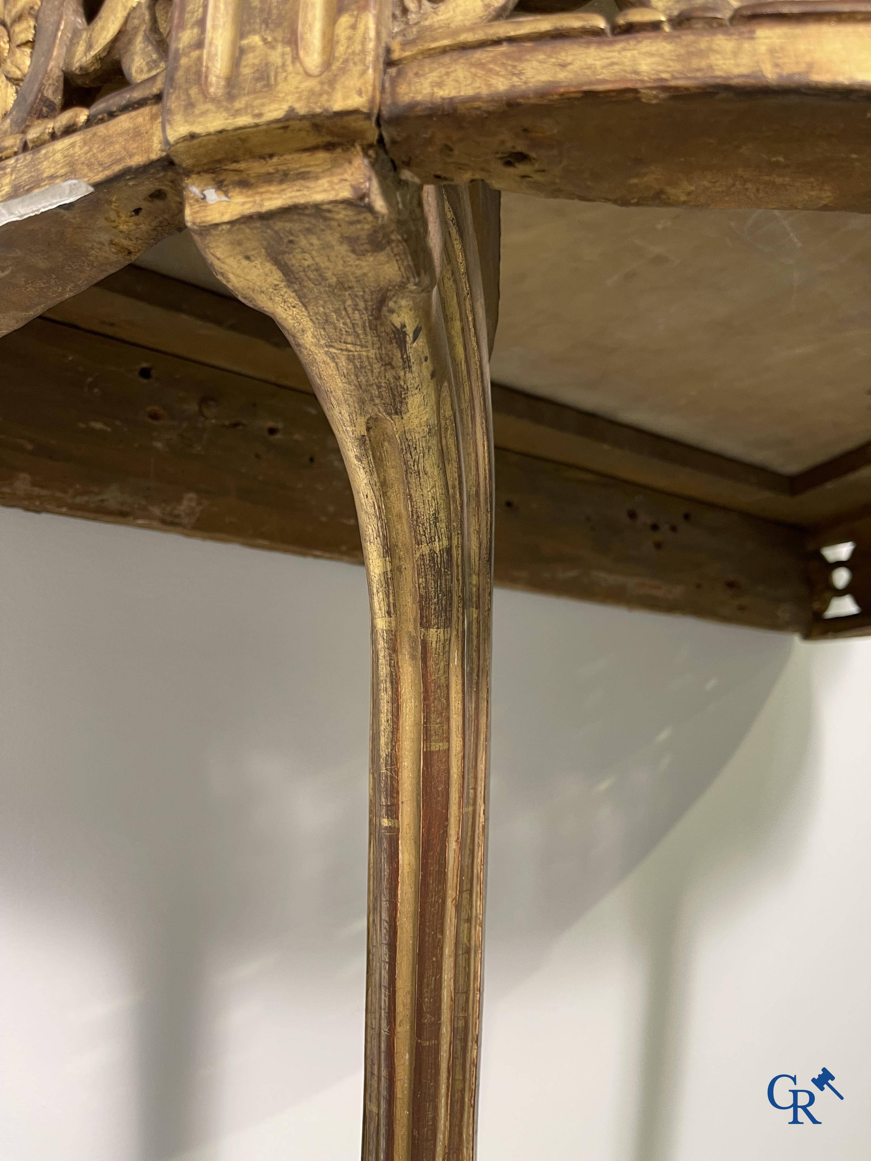 Furniture: Wood sculpted and gilded crescent shaped console. LXVI-period.