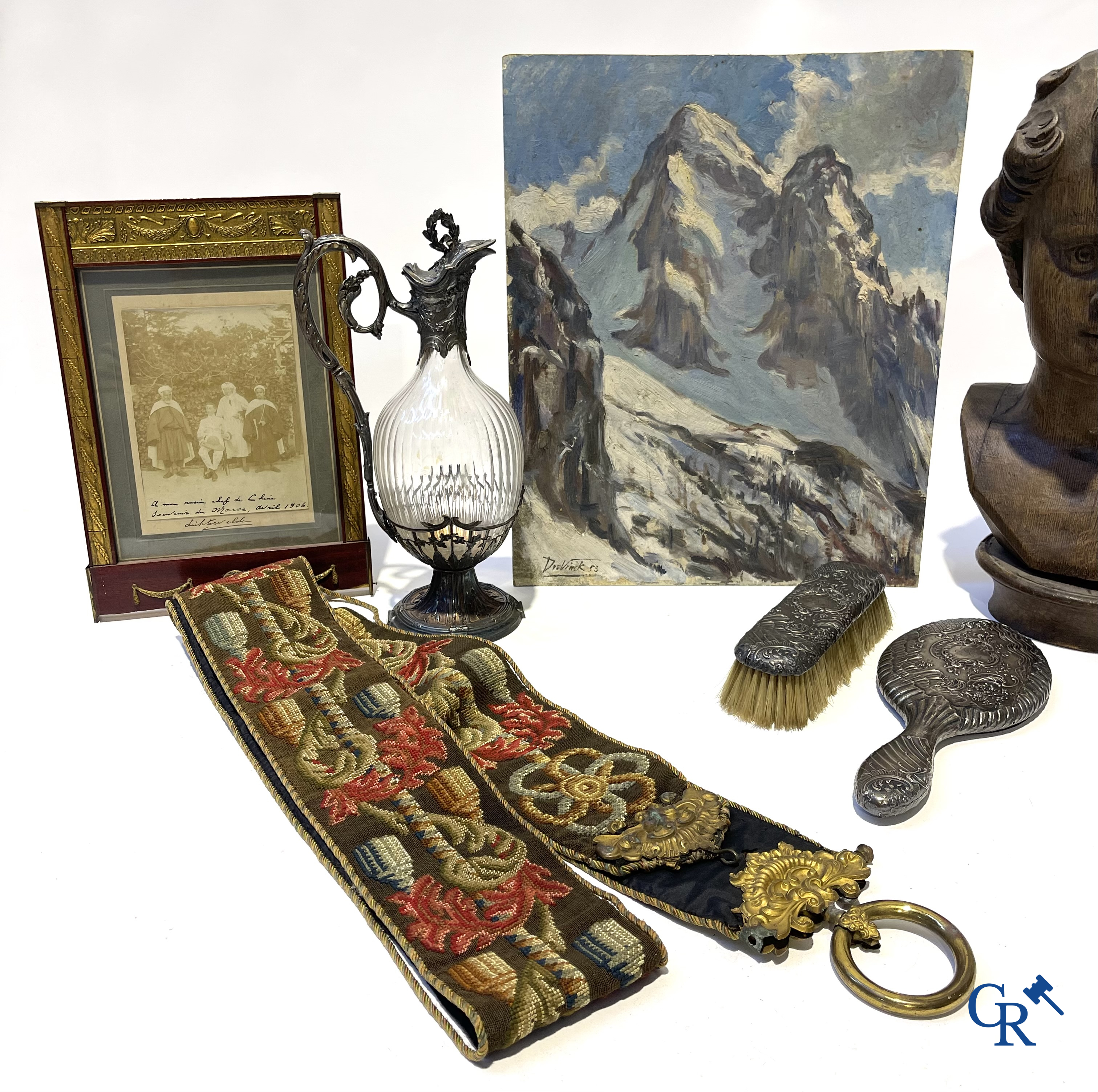 A nice lot of brocante, carafe with silver mounts, painting, wooden bust, old photo, etc.