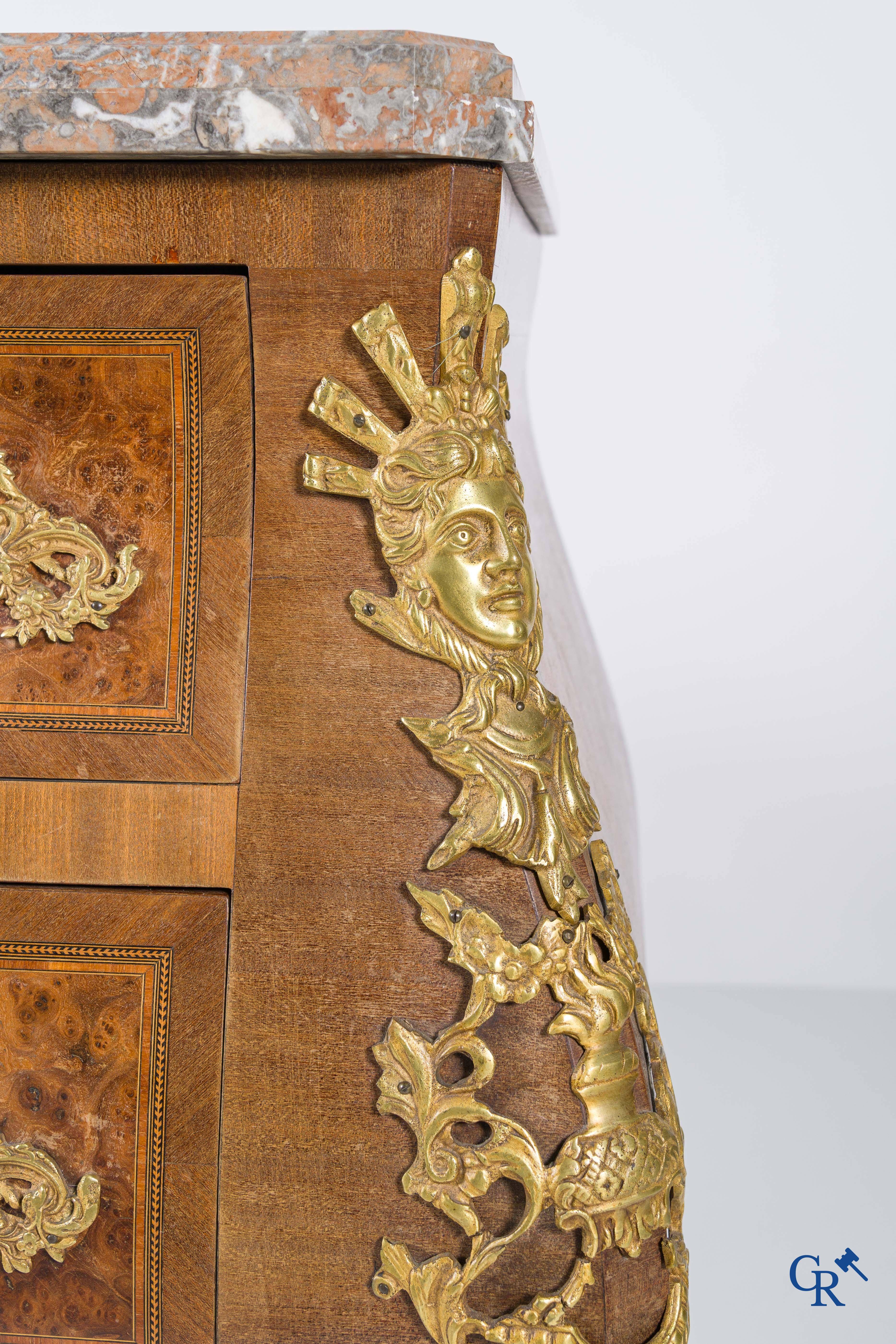 Chest of drawers with bronze fittings and a marble top, LXV style.