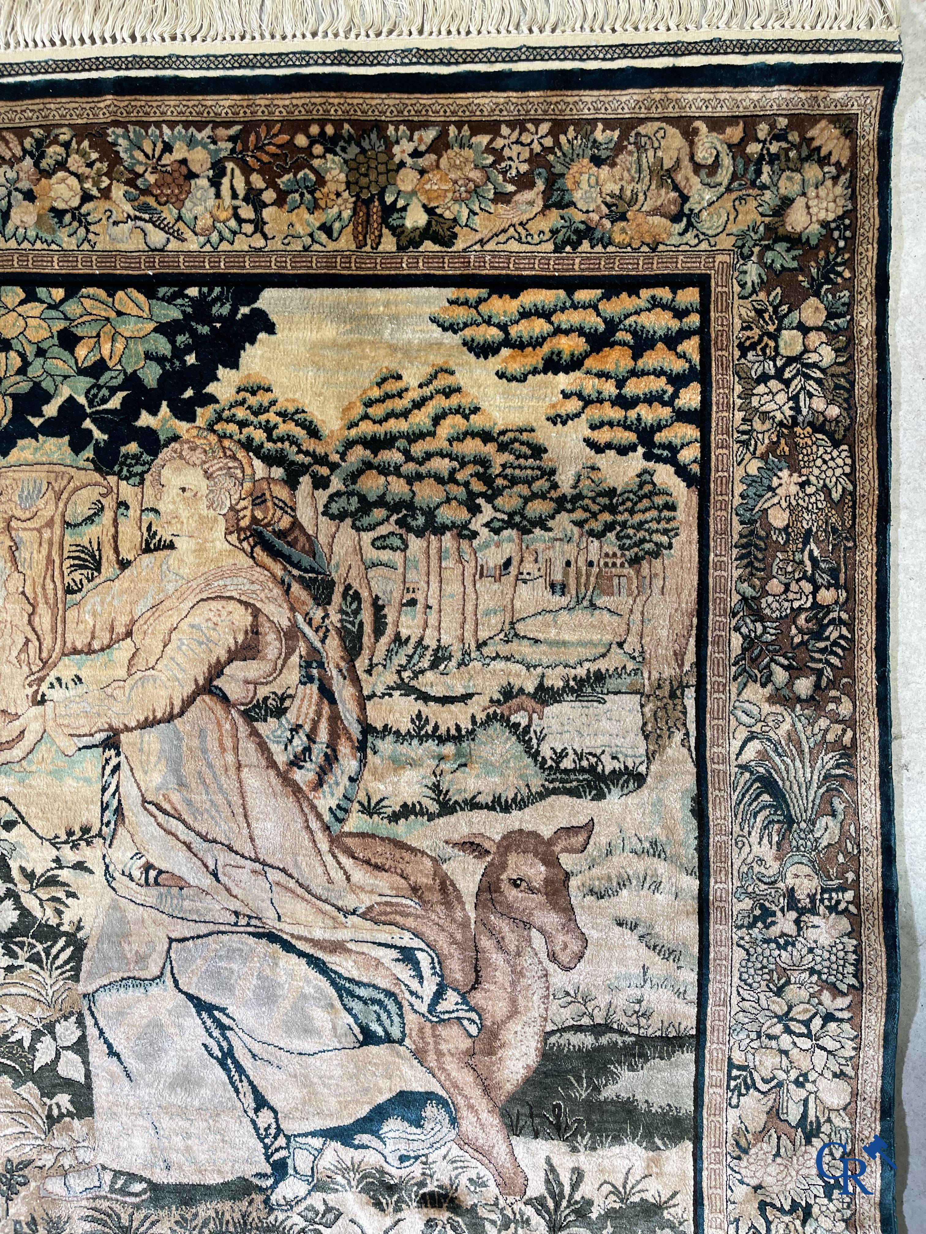 Oriental carpets, a finely knotted silk tapestry with Renaissance scenes. Signed.