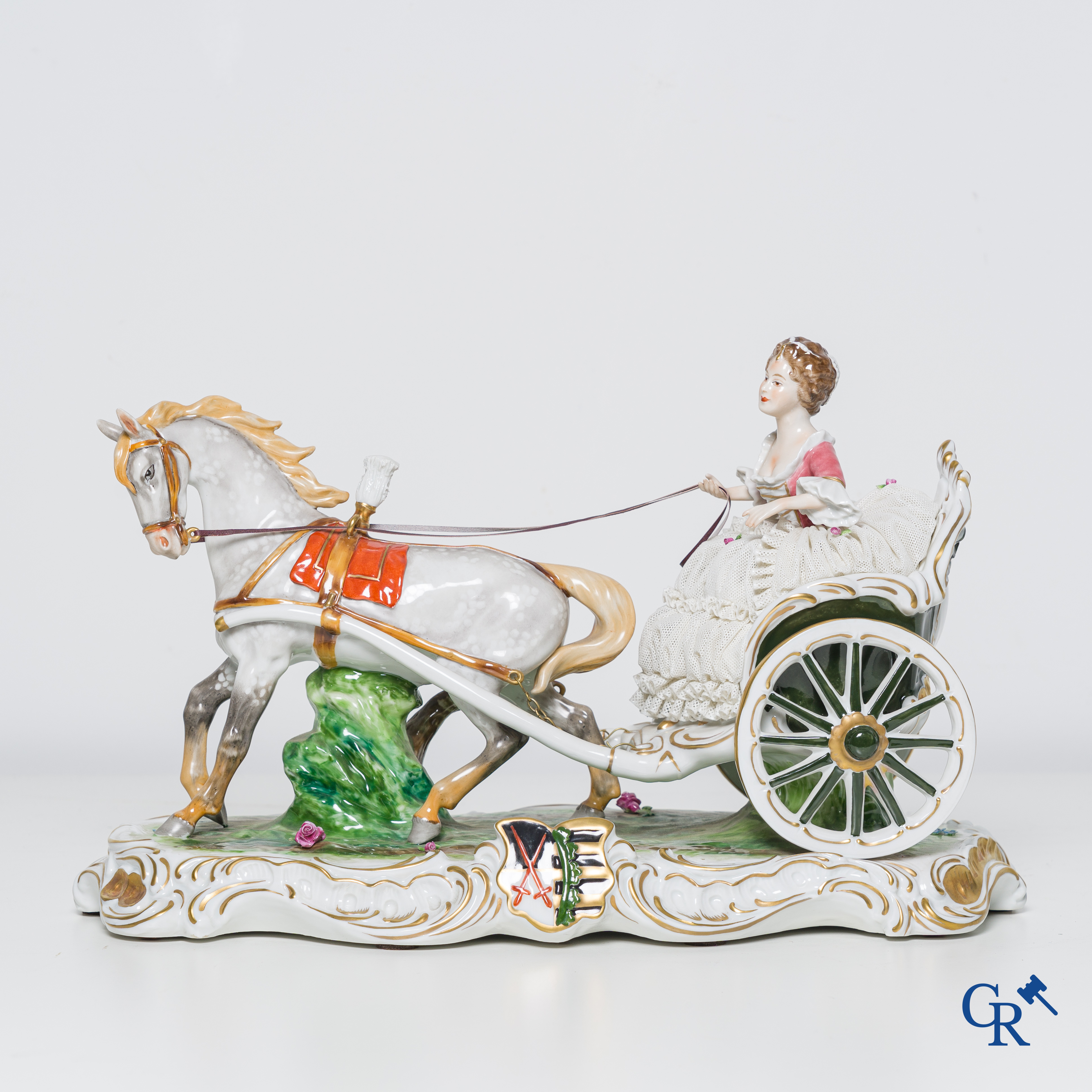 German porcelain, a group in Volkstedt porcelain. Elegant lady in a carriage.