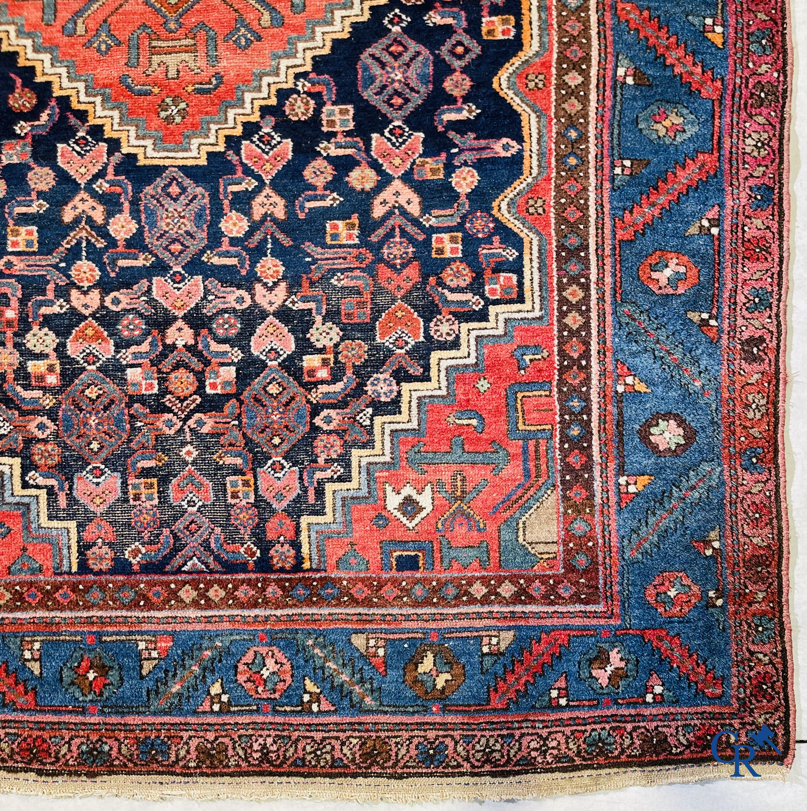 Oriental carpets, 2 antique hand-knotted Oriental carpets.