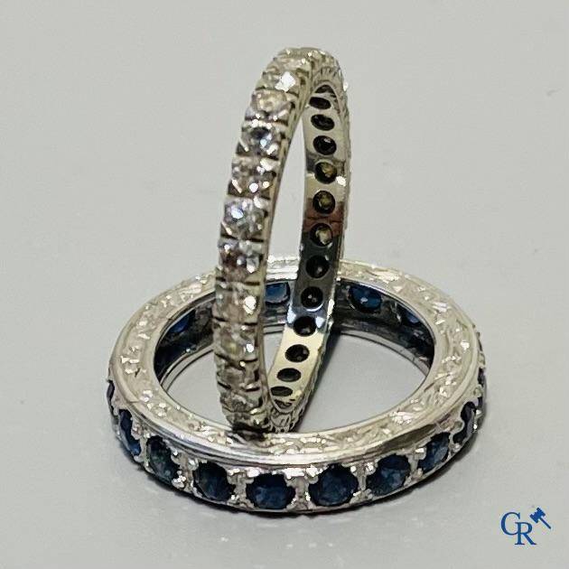 Jewellery, an American wedding ring in white gold 750°/00 and diamonds and a ring in white gold 375°/00 and sapphire.