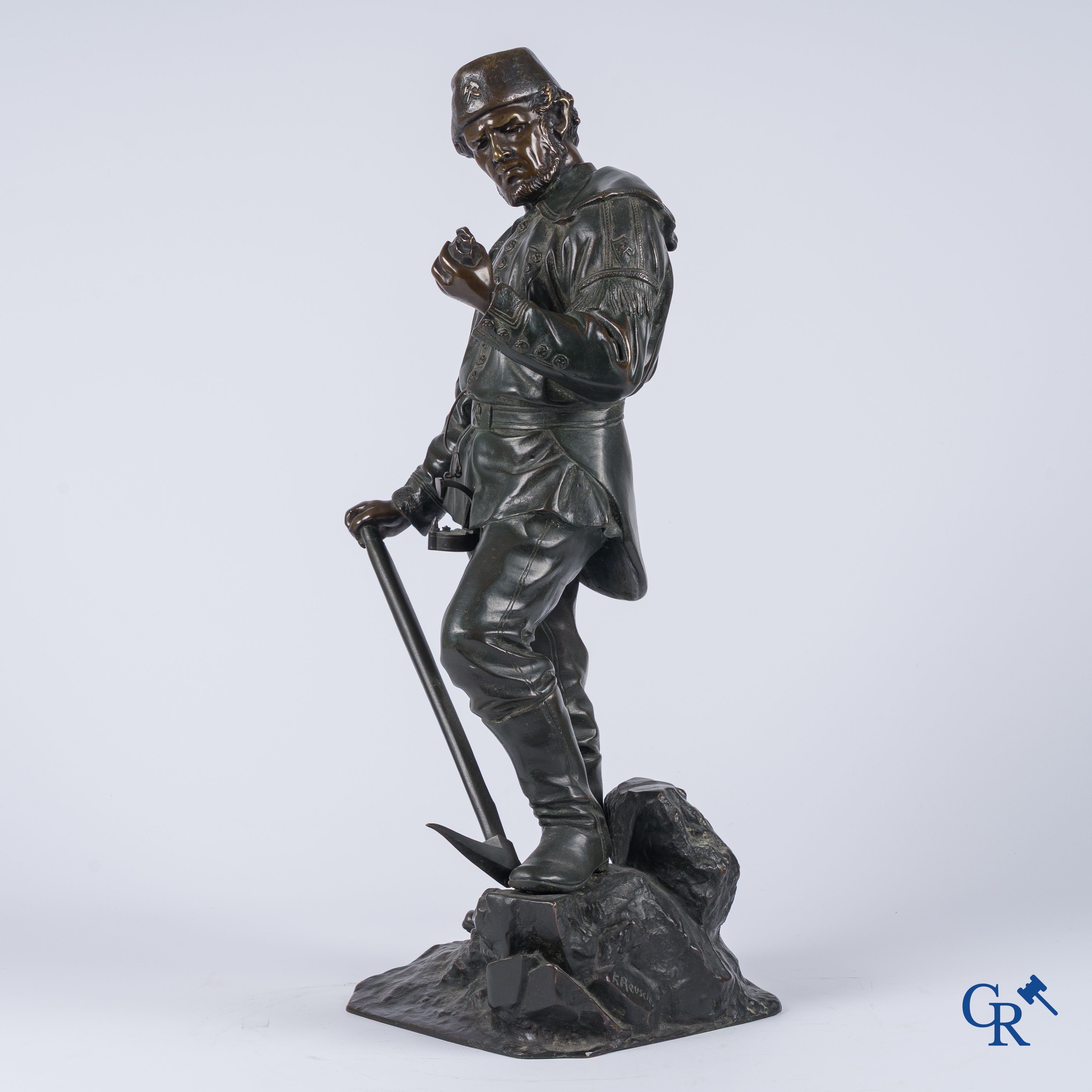 Friedrich Johann Reusch (1843-1906) Bronze, Siegerland miner investigating an iron ore.
