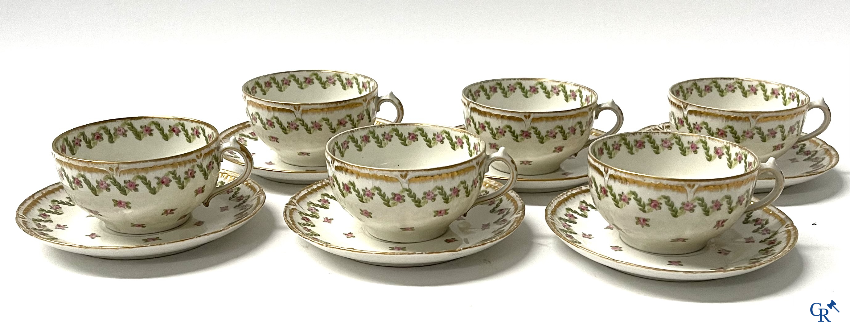 A coffee and tea set with 12 dessert plates in gilded and polychrome decorated French porcelain. Around 1900.