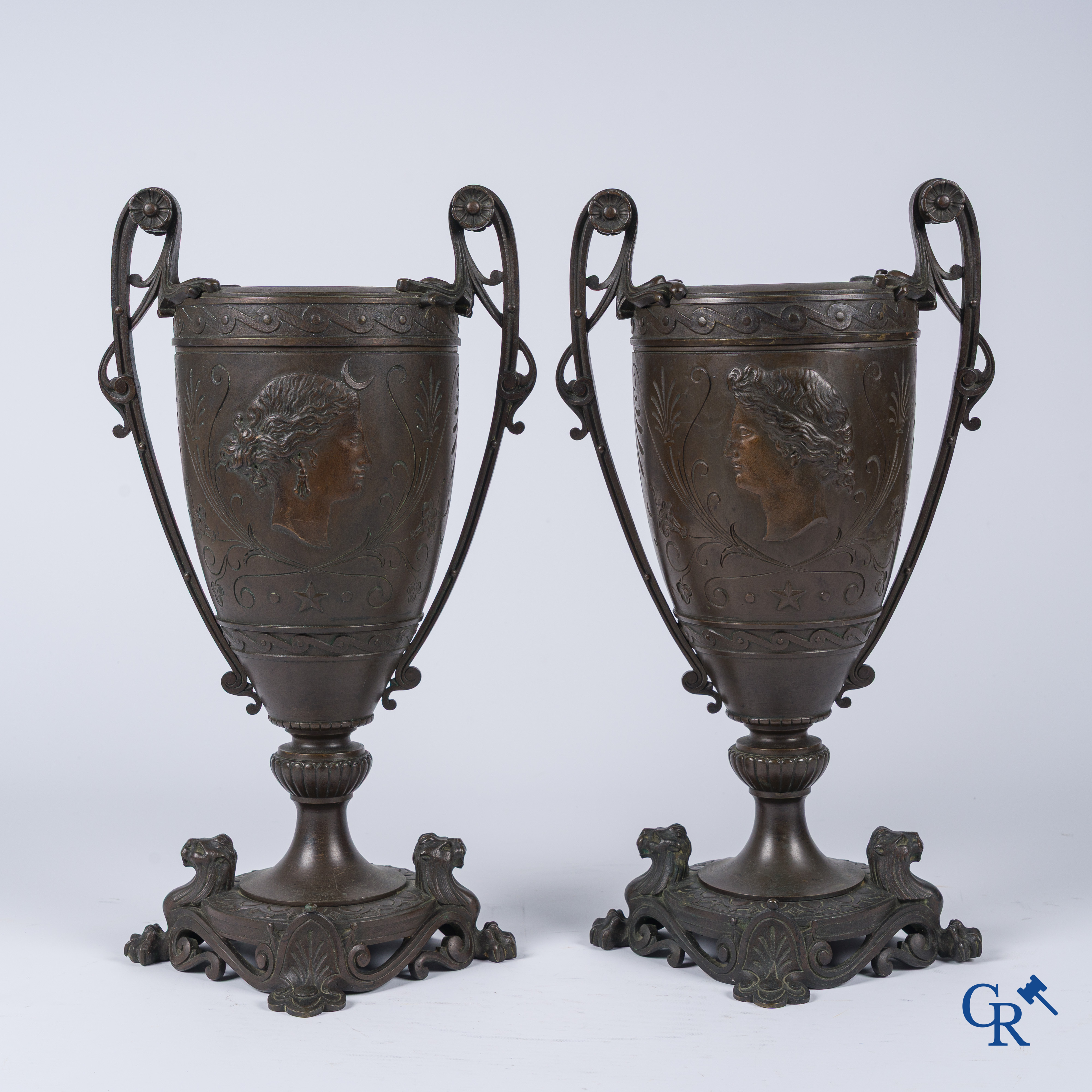 Louis Léon Cugnot (1835-1894) A large 3-piece bronze chimney set "La Fileuse" Signed L. Cugnot.