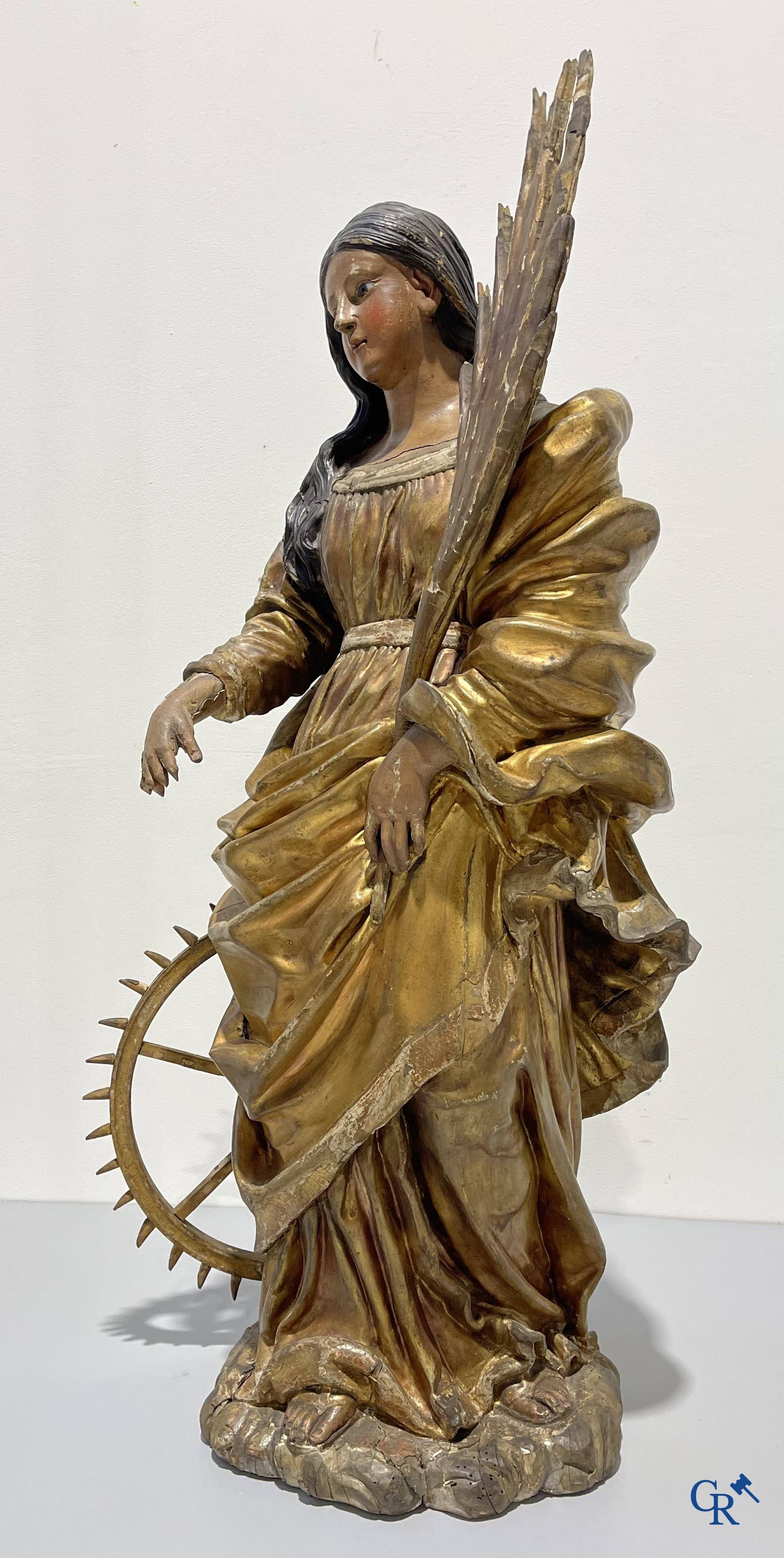 Exceptionally polychrome wooden statue of Saint Catherine of Alexandria with glass eyes, 18th century.