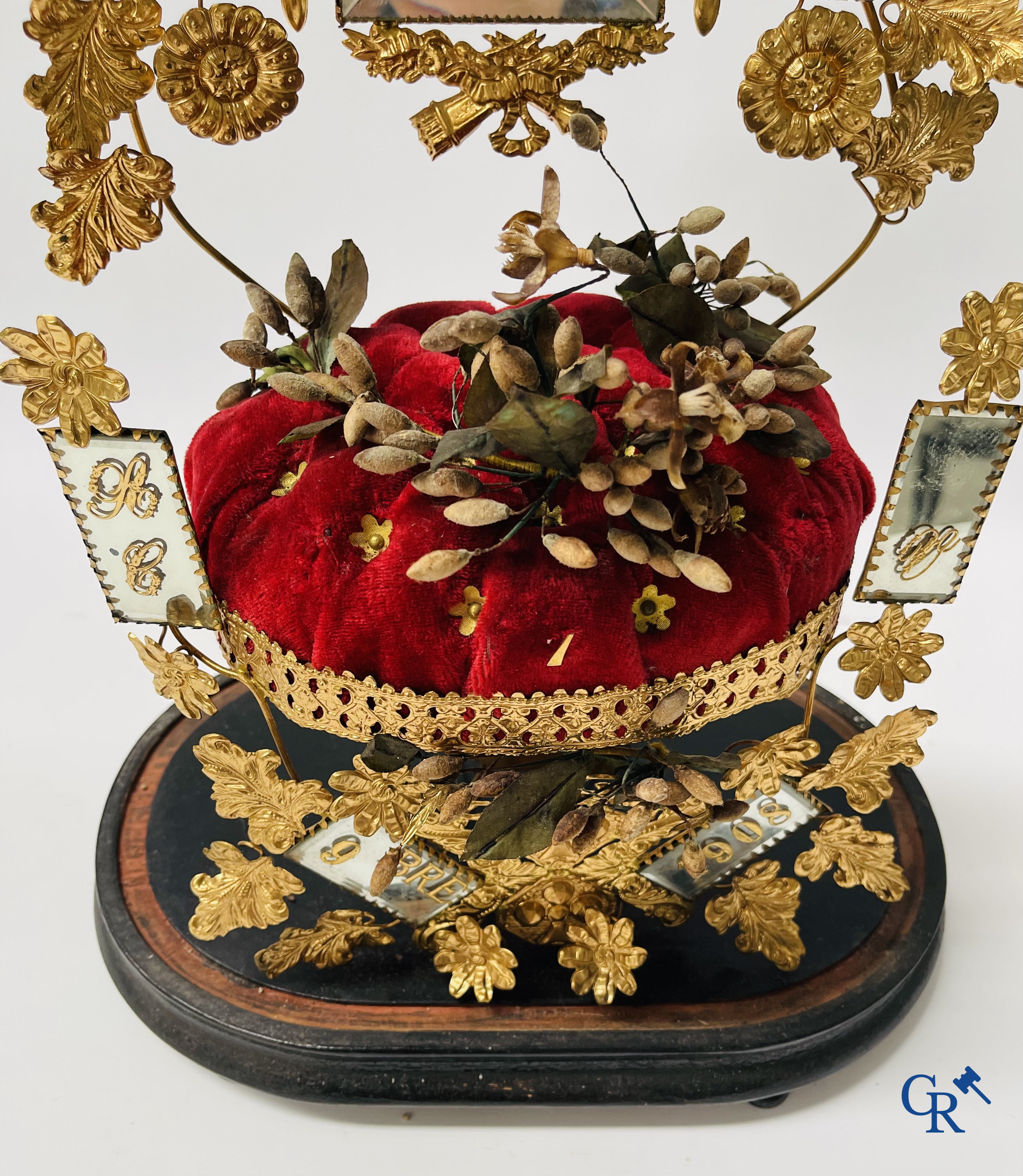 2 domes with wedding bouquet, one with flowers in biscuit, another with mirrors, dated 1908.