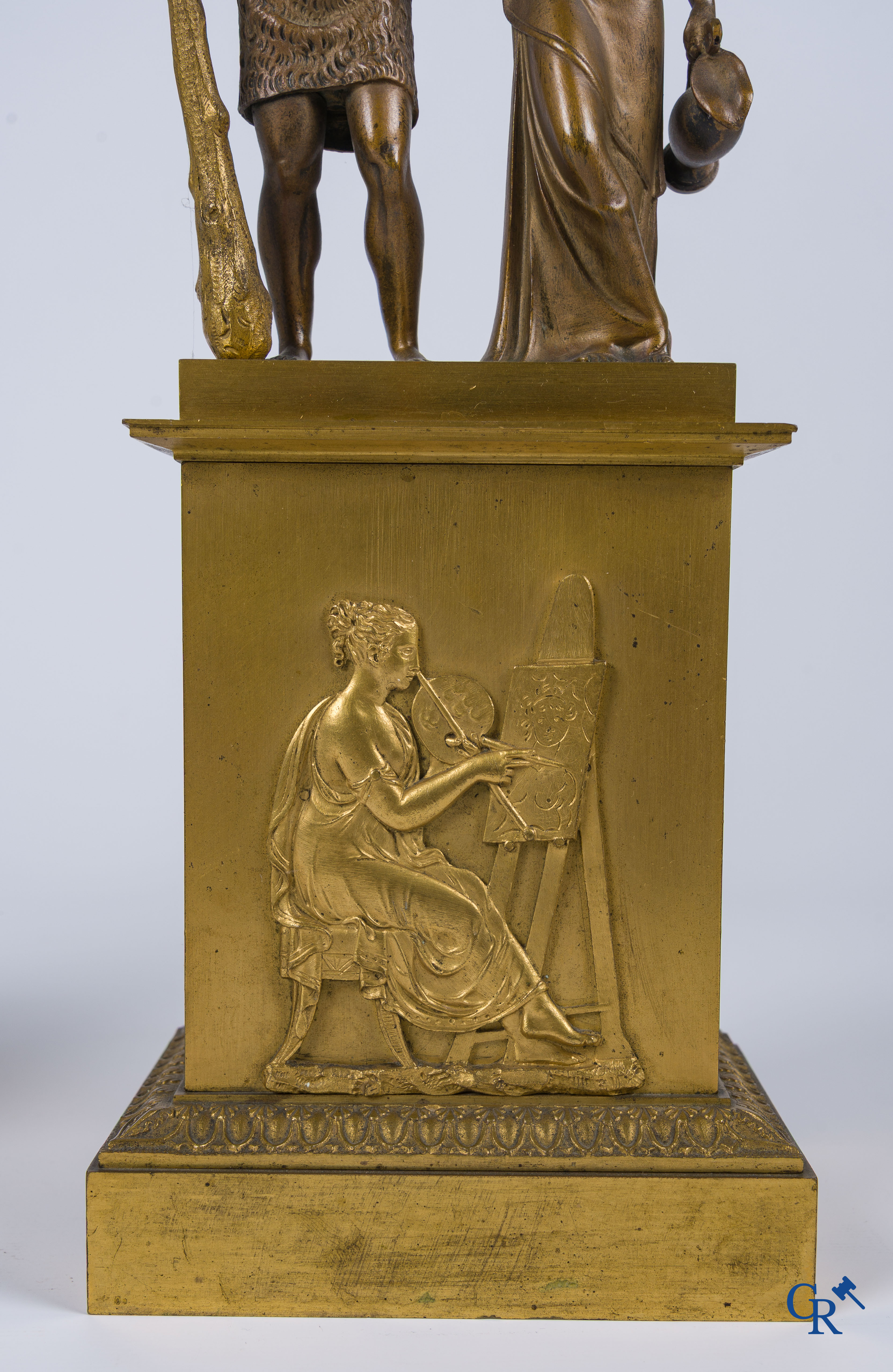 Empire era. A pair of large bronze candlesticks with characters in the antique style. Empire, circa 1815.