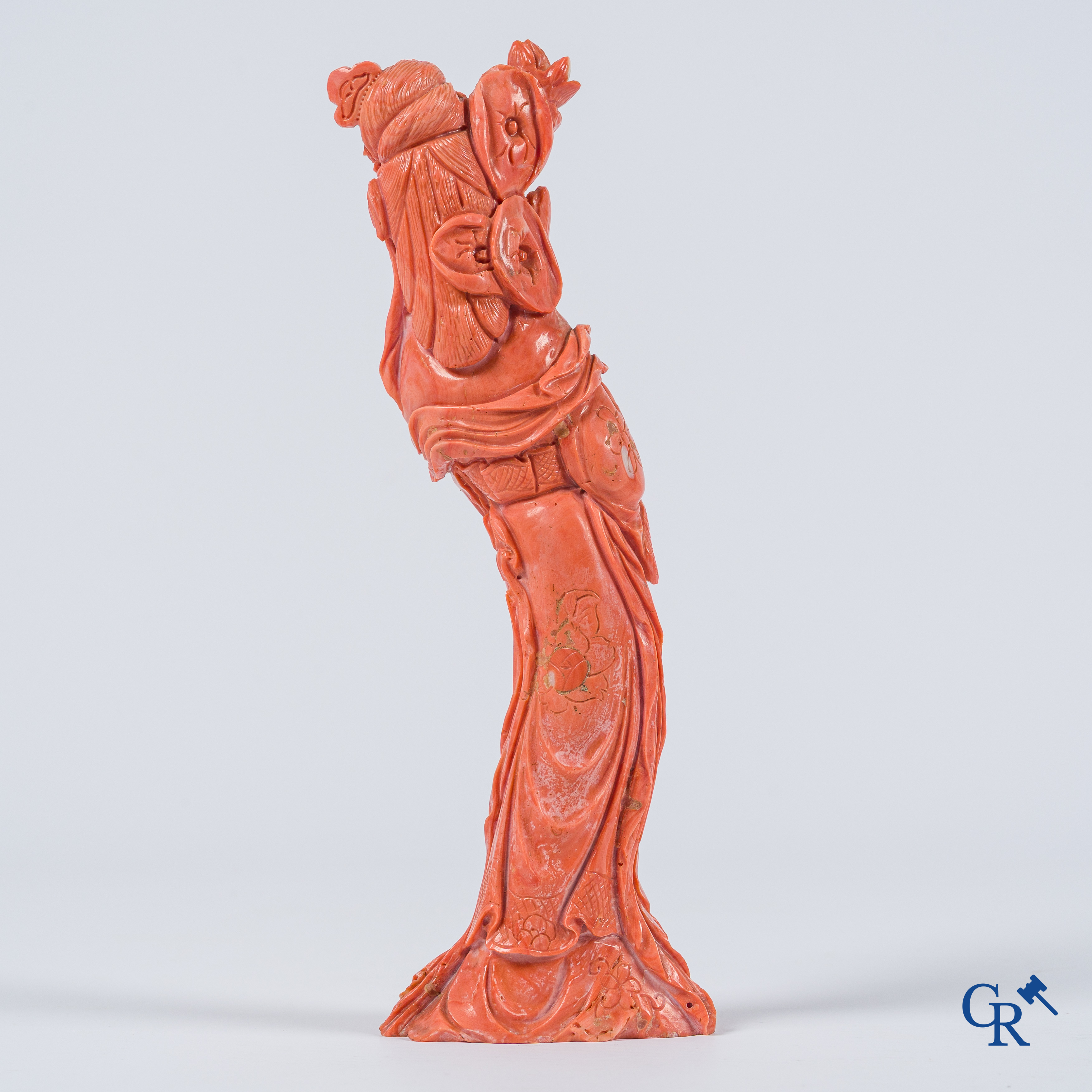 Asian Art, China. A red coral figure of a Chinese lady on a wooden pedestal.