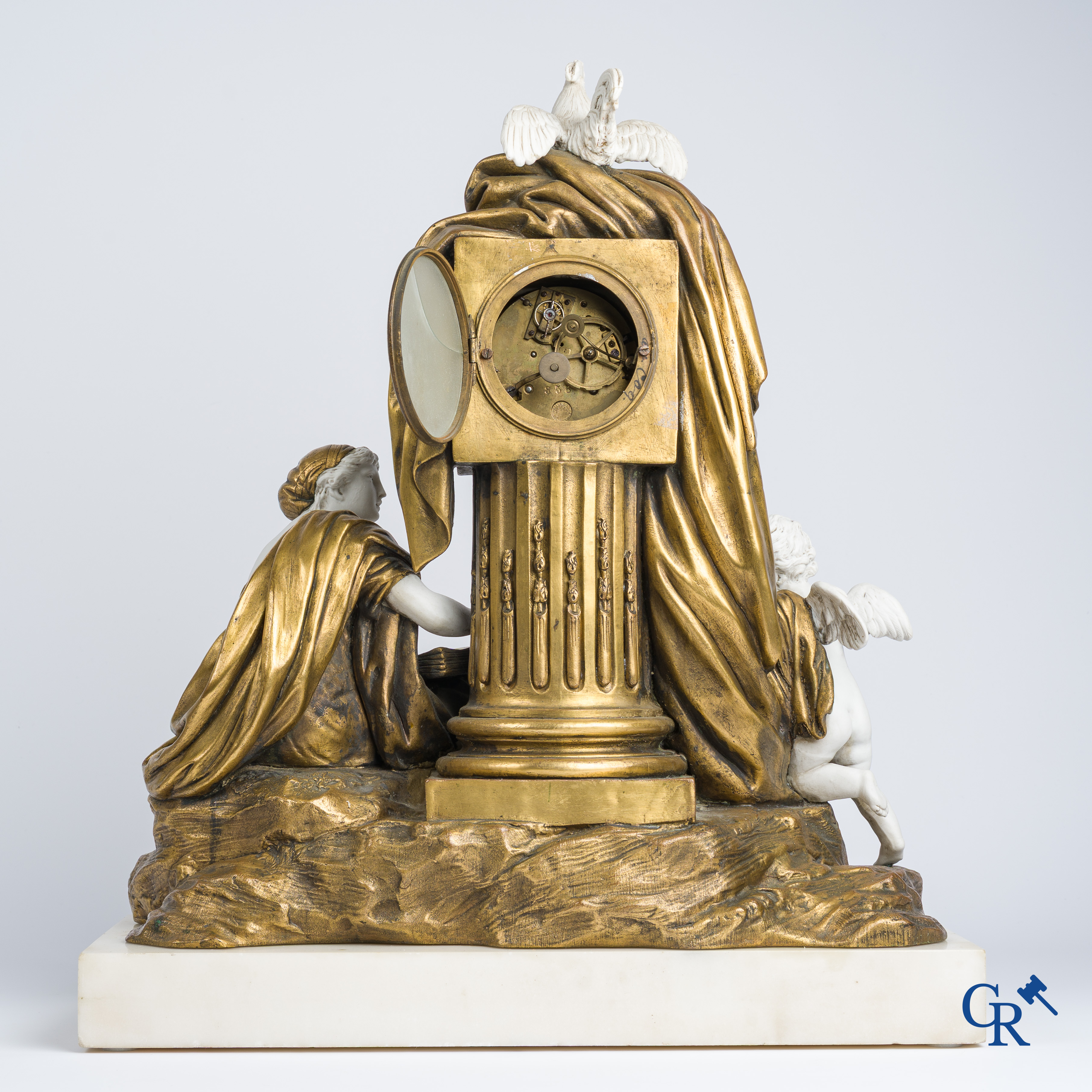 A fireplace clock in bronze, white marble and Sèvres biscuit. French work circa 1880.