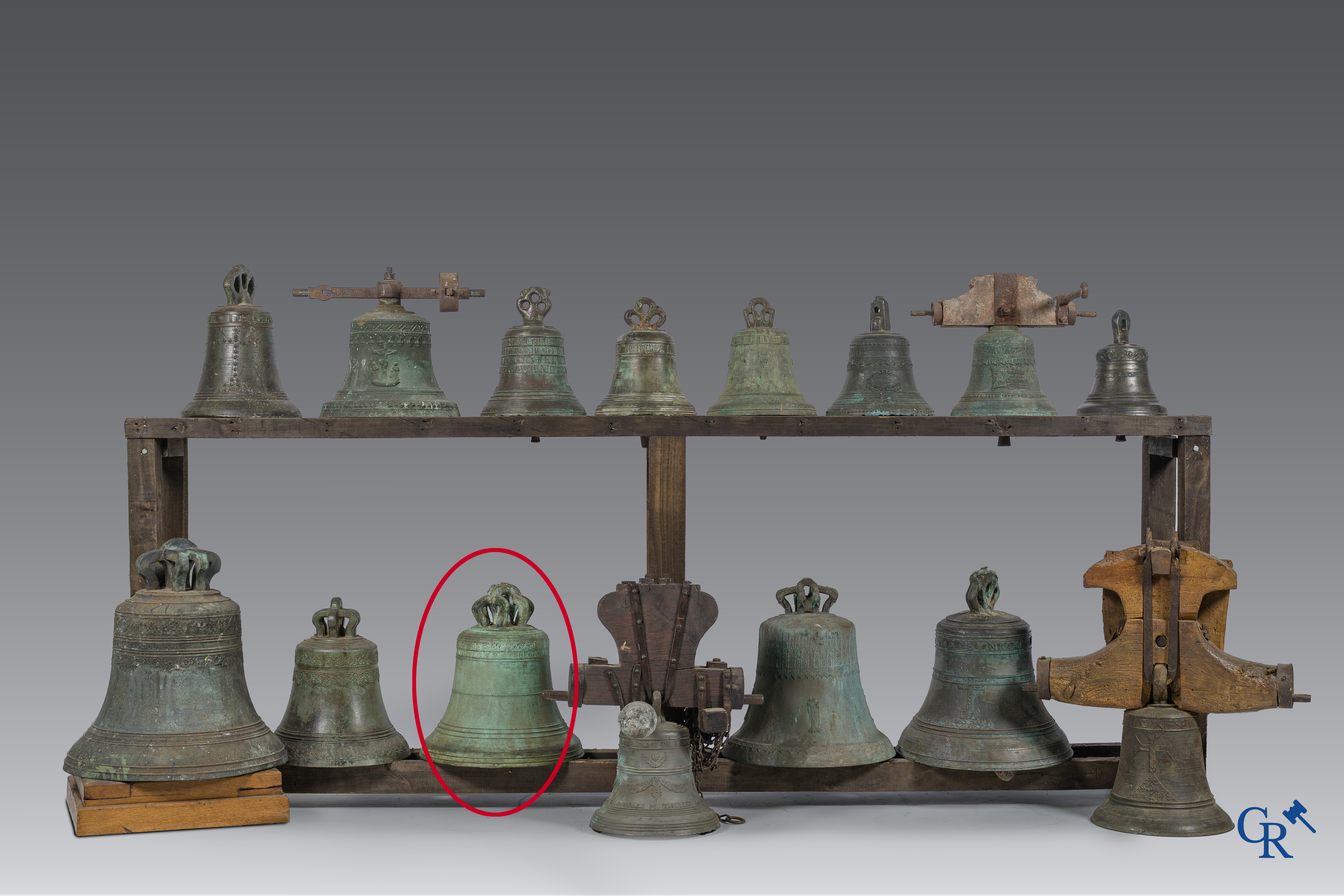 Religious objects. Large antique church crown clock or bell in bronze with inscription band. Dated 1649.