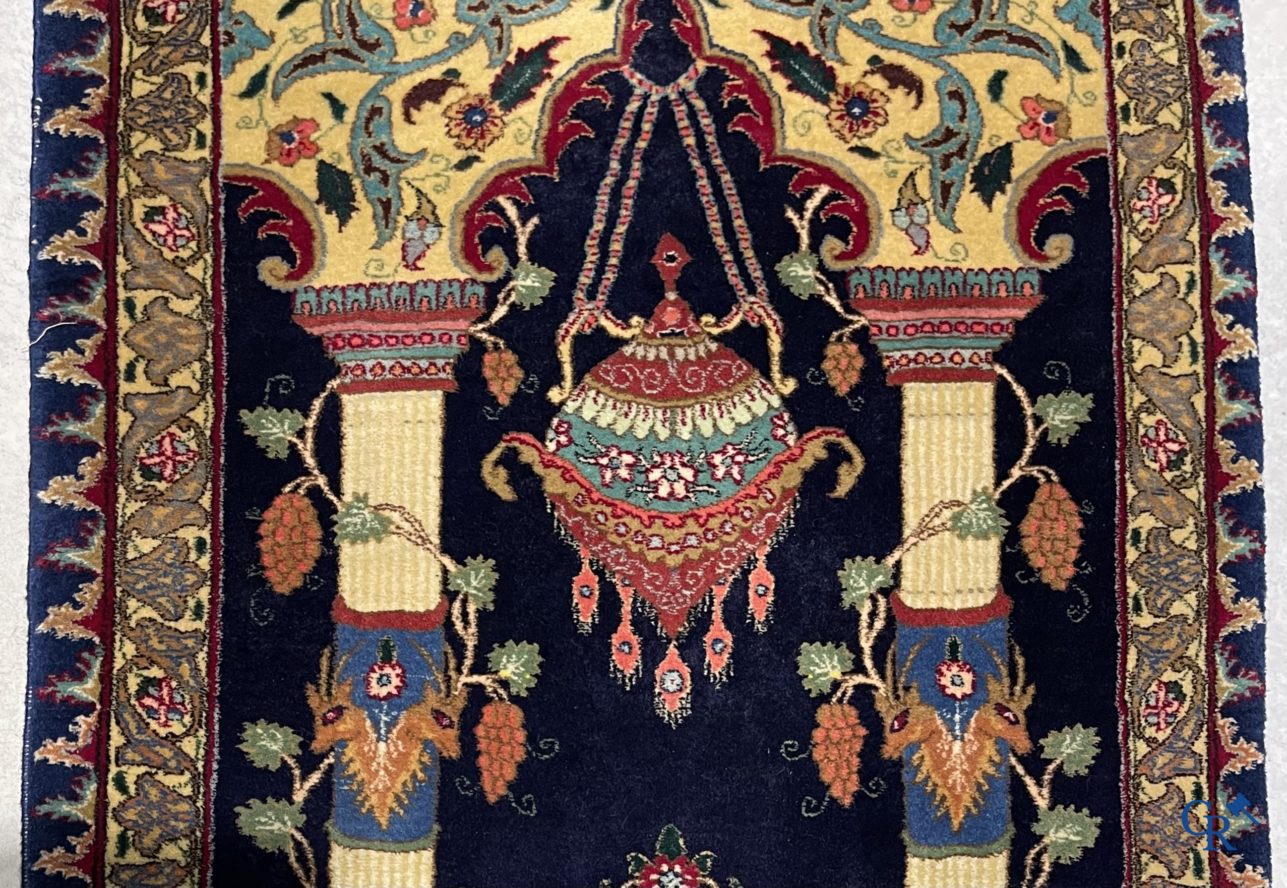 Oriental carpets. A wool prayer carpet.
