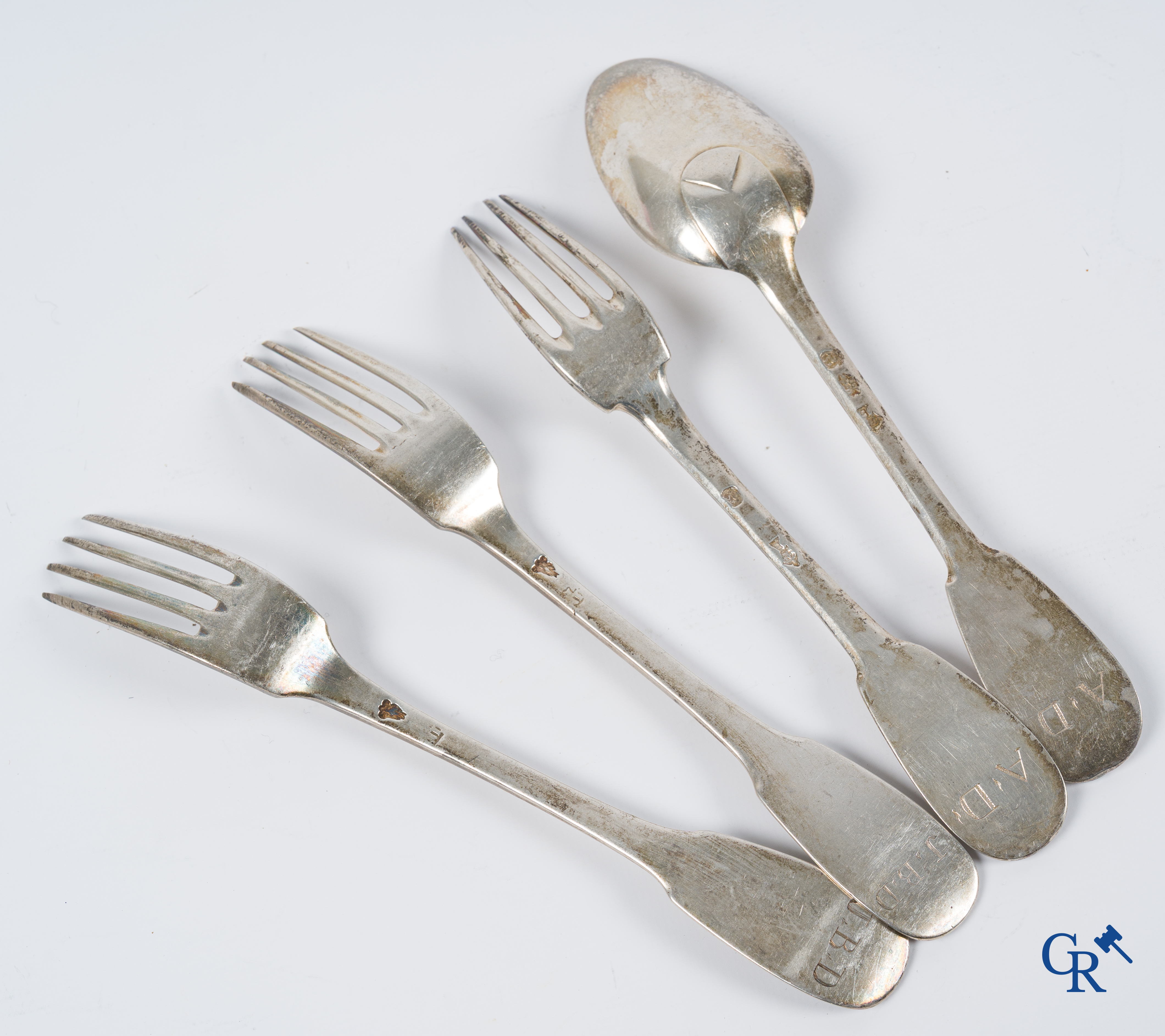 Silver. Very interesting and big lot with silver cutlery. 18th century. Different hallmarks. 20 forks and 15 spoons.