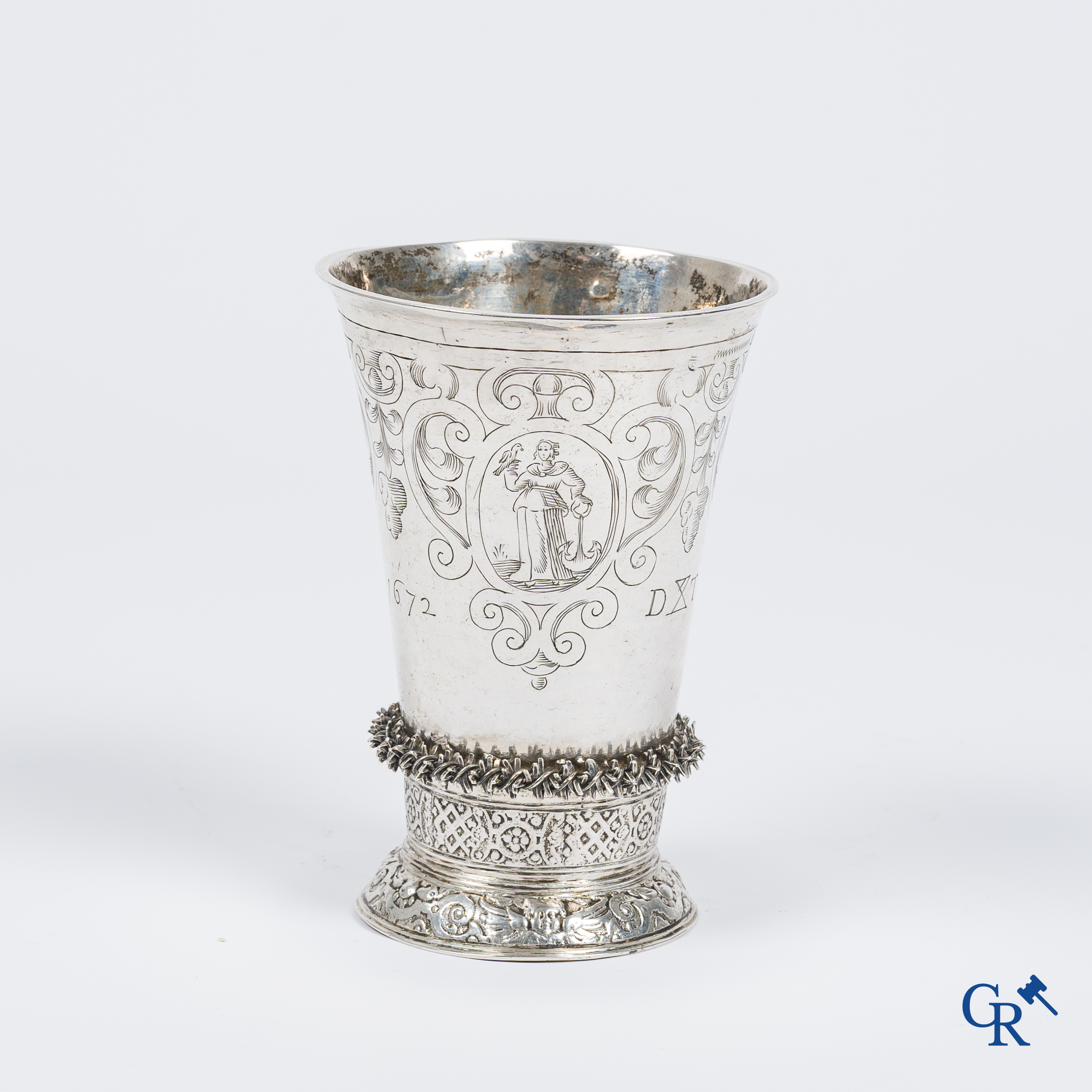 Holland, 17th century. Groningen cup in silver with Thaler of Osnabrück 1633 in the bottom. 