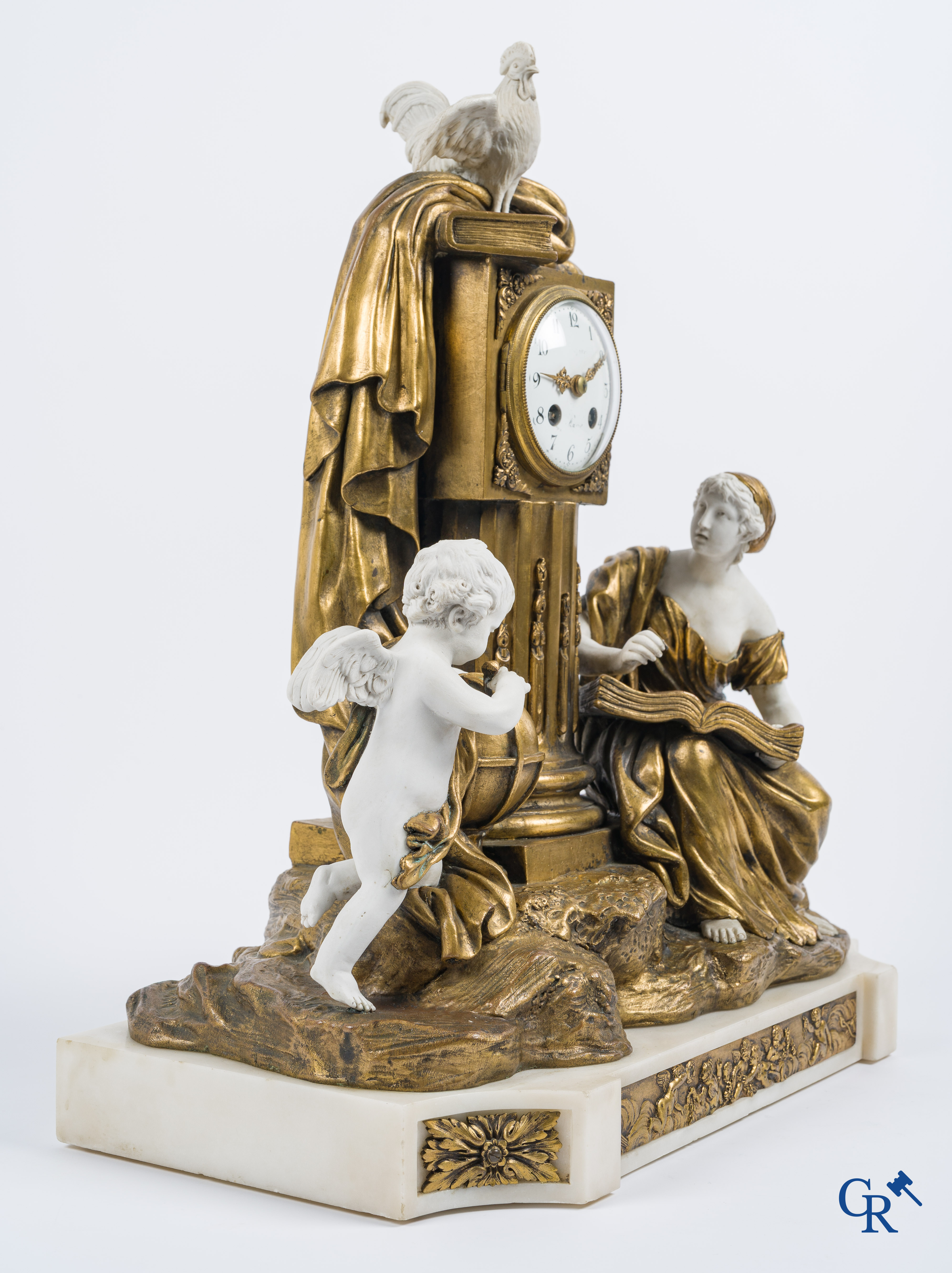 A fireplace clock in bronze, white marble and Sèvres biscuit. French work circa 1880.