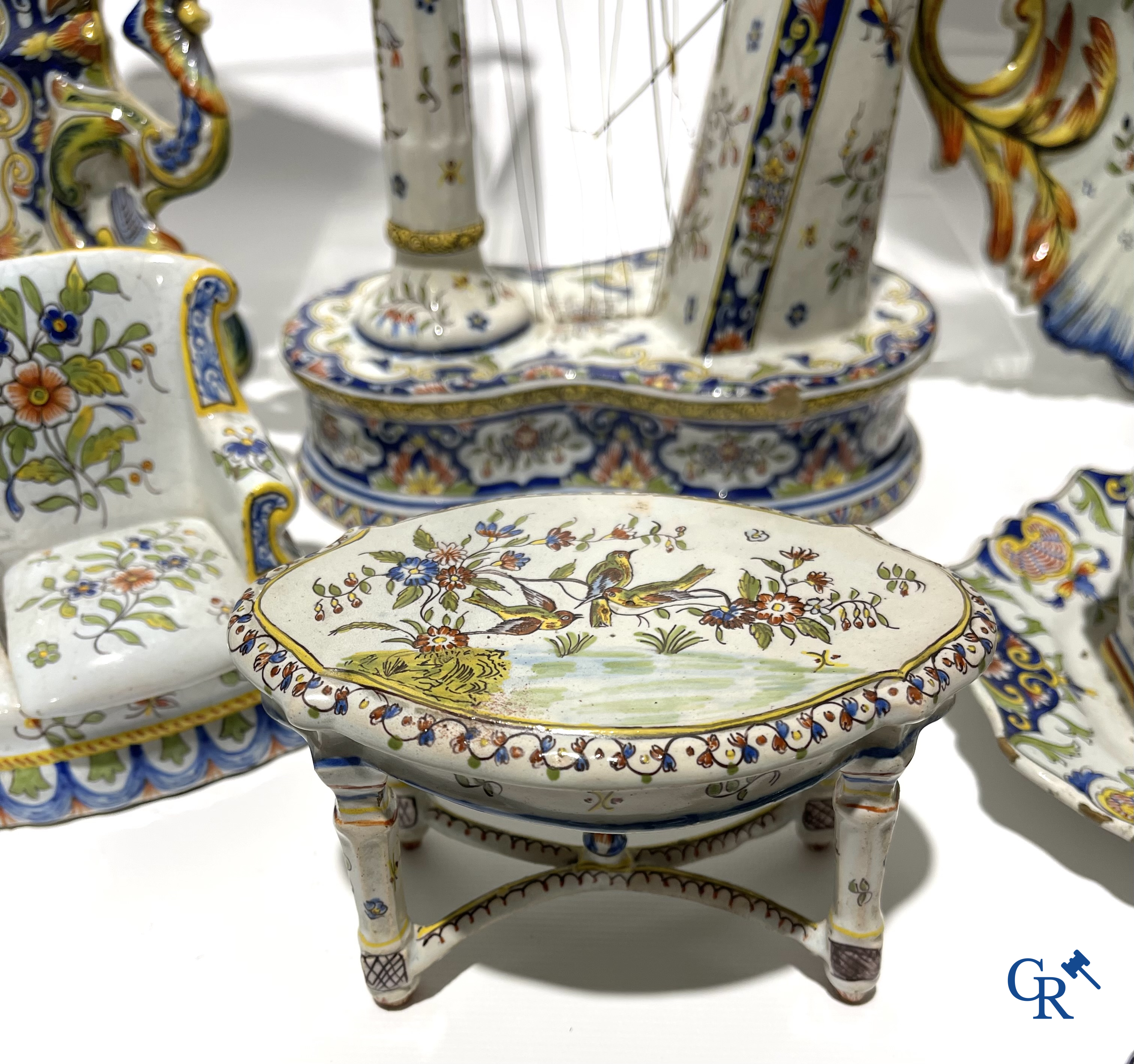 Faience of Rouen, Devres. Interesting and large lot with various polychrome pieces. 19th century.