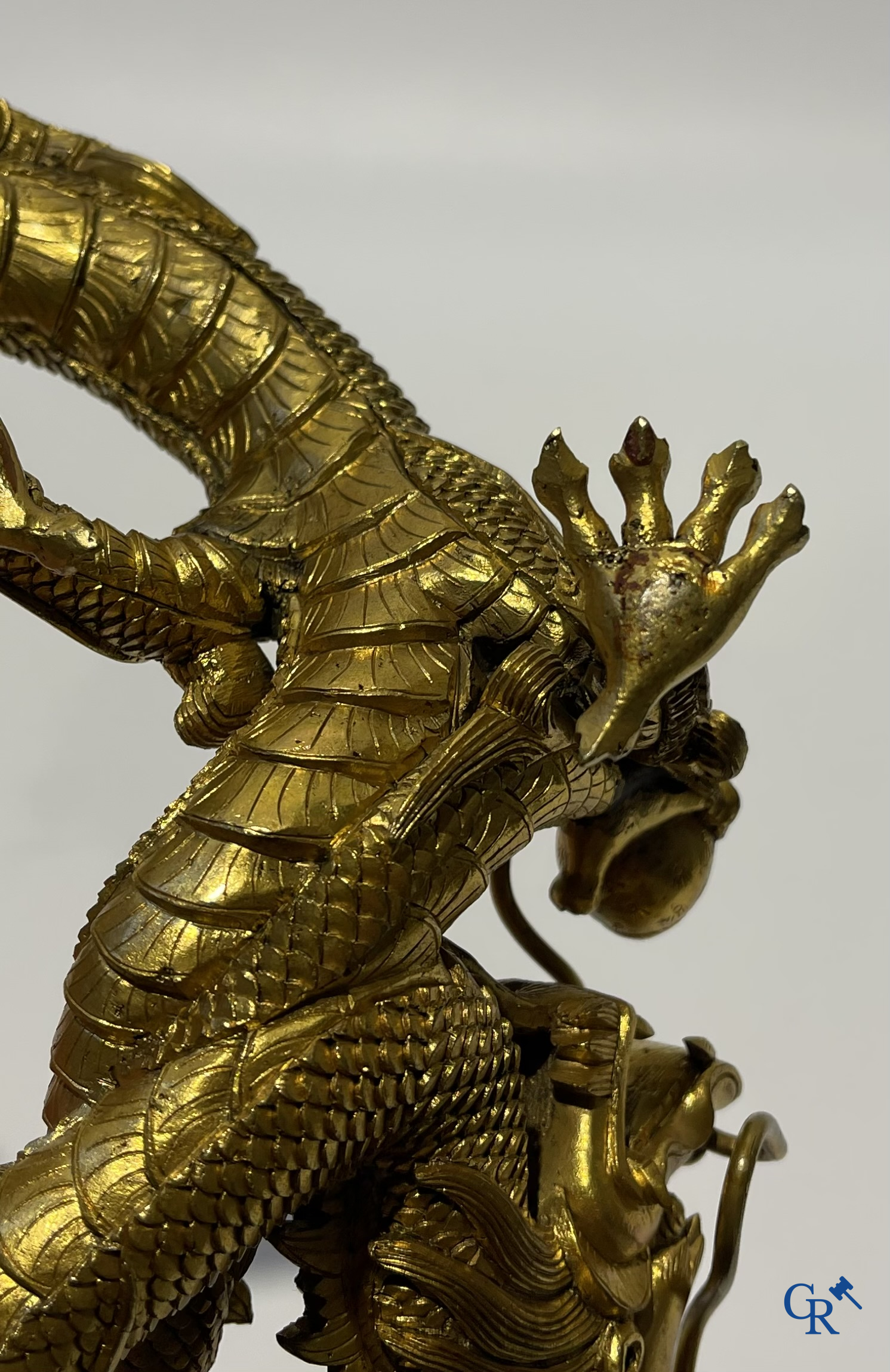 Asian Art. China. A rare Chinese gilt-bronze dragon stand. Qing Dynasty.