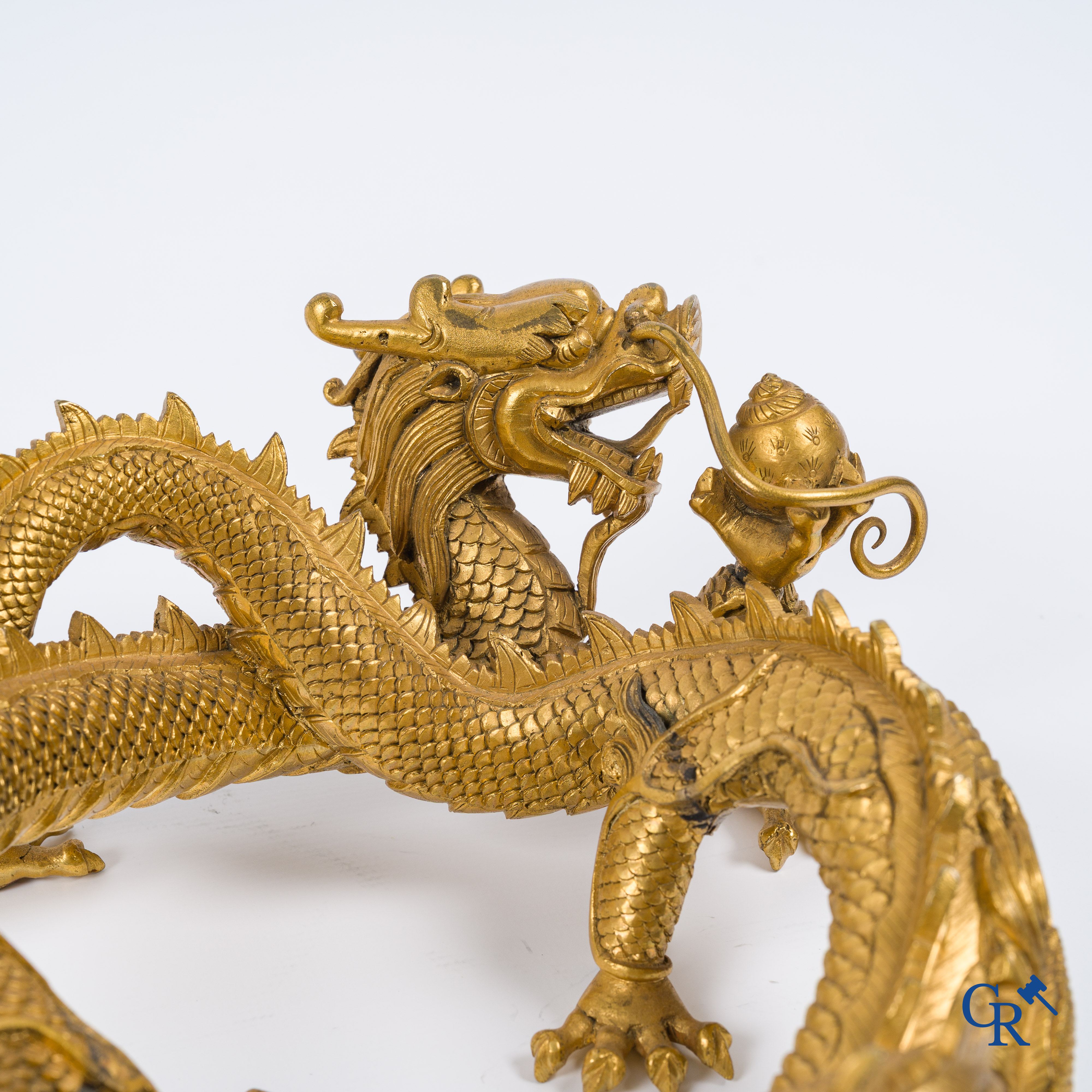 Asian Art. China. A rare Chinese gilt-bronze dragon stand. Qing Dynasty.