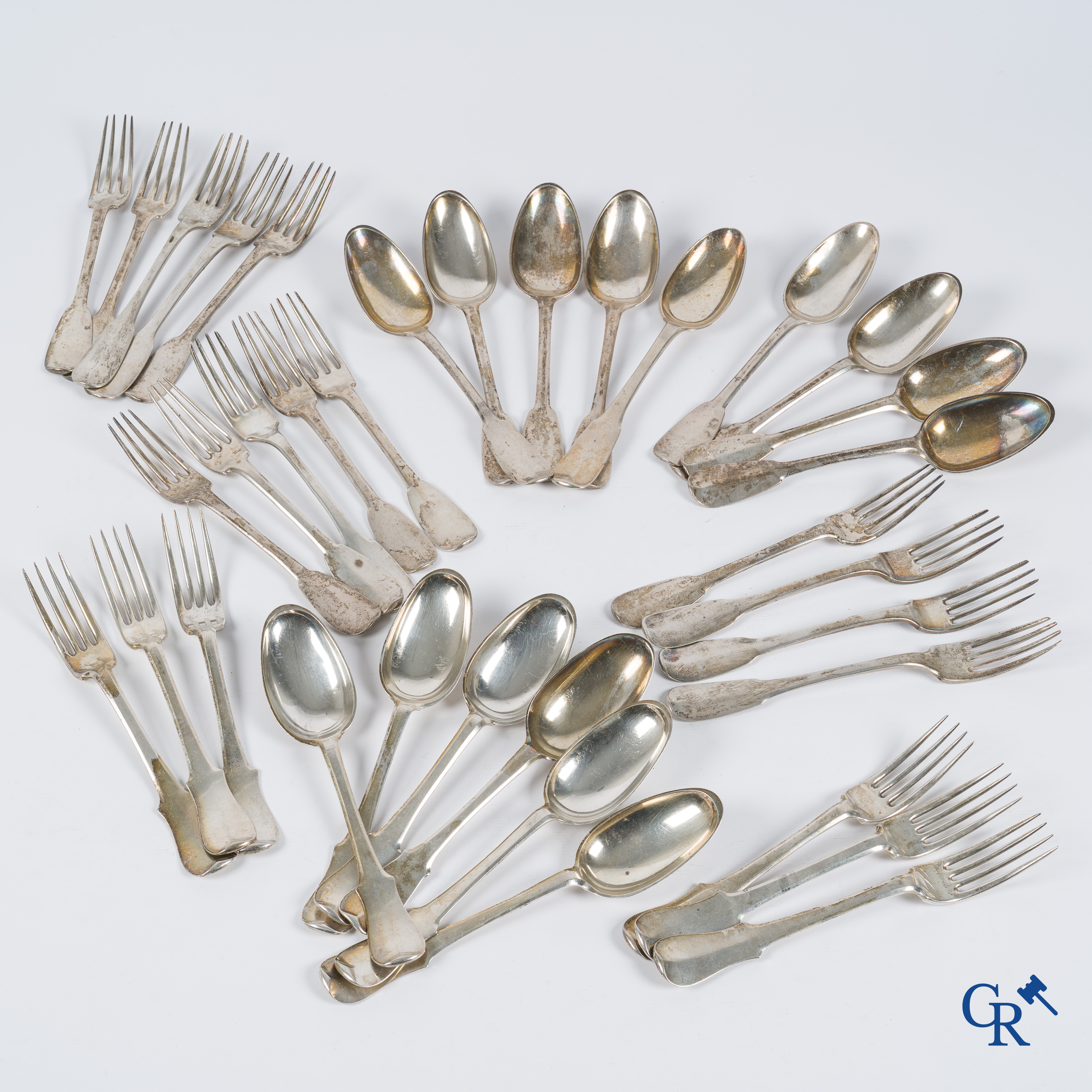 Silver. Very interesting and big lot with silver cutlery. 18th century. Different hallmarks. 20 forks and 15 spoons.