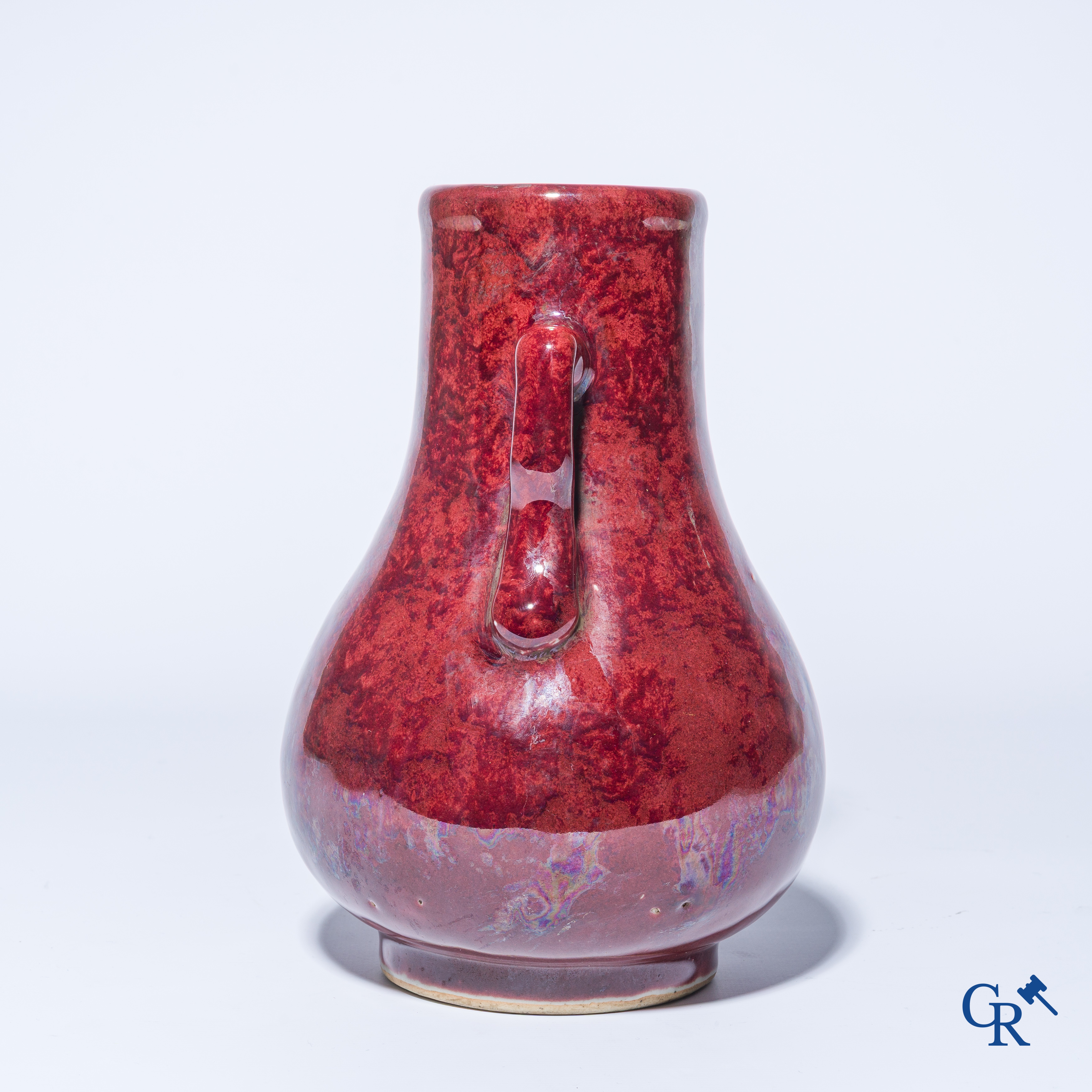 Asian Art. A Chinese porcelain Sang de boeuf vase. 19th century.
