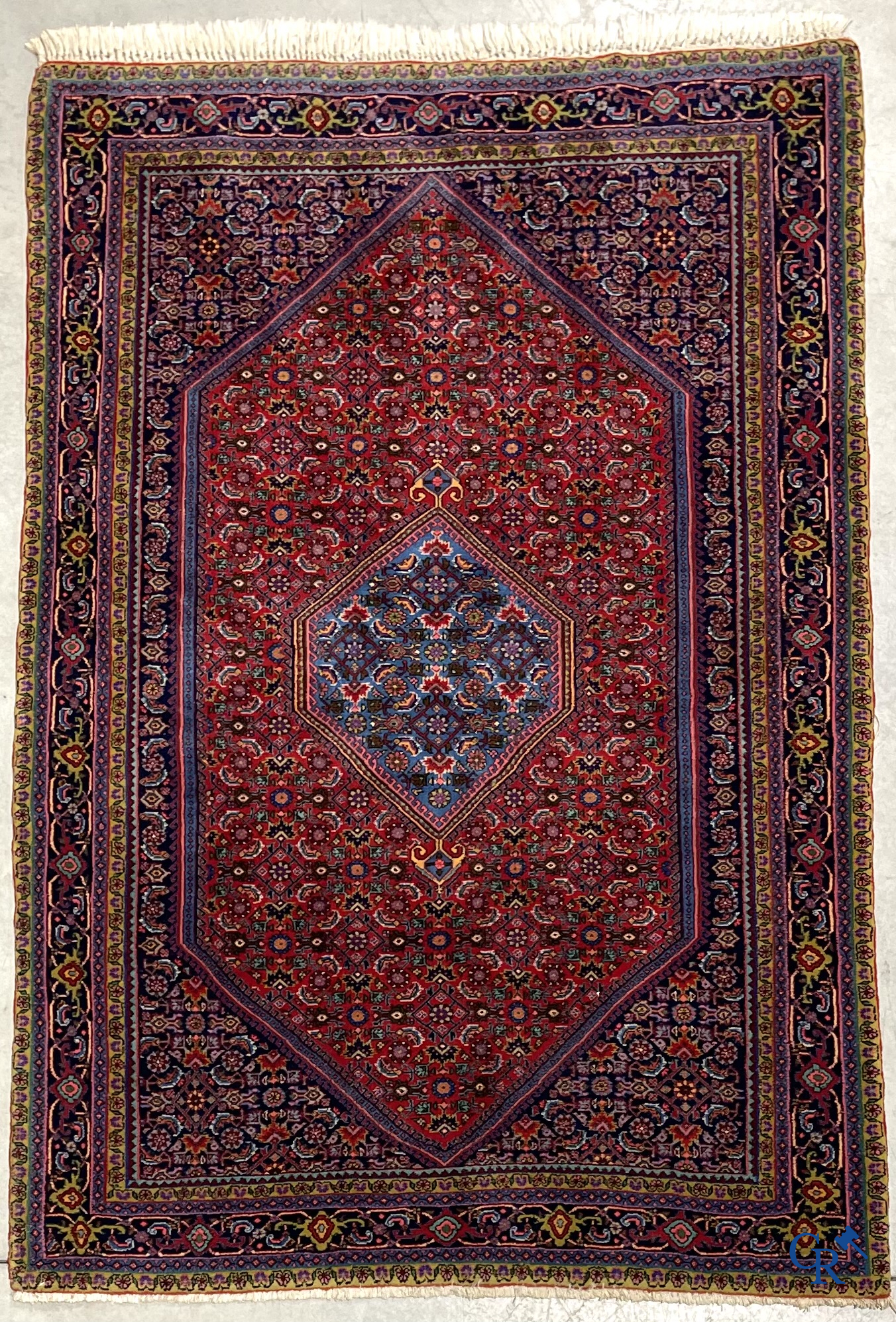 Oosterse tapijten. 2 handgeknoopte tapijten in wol.