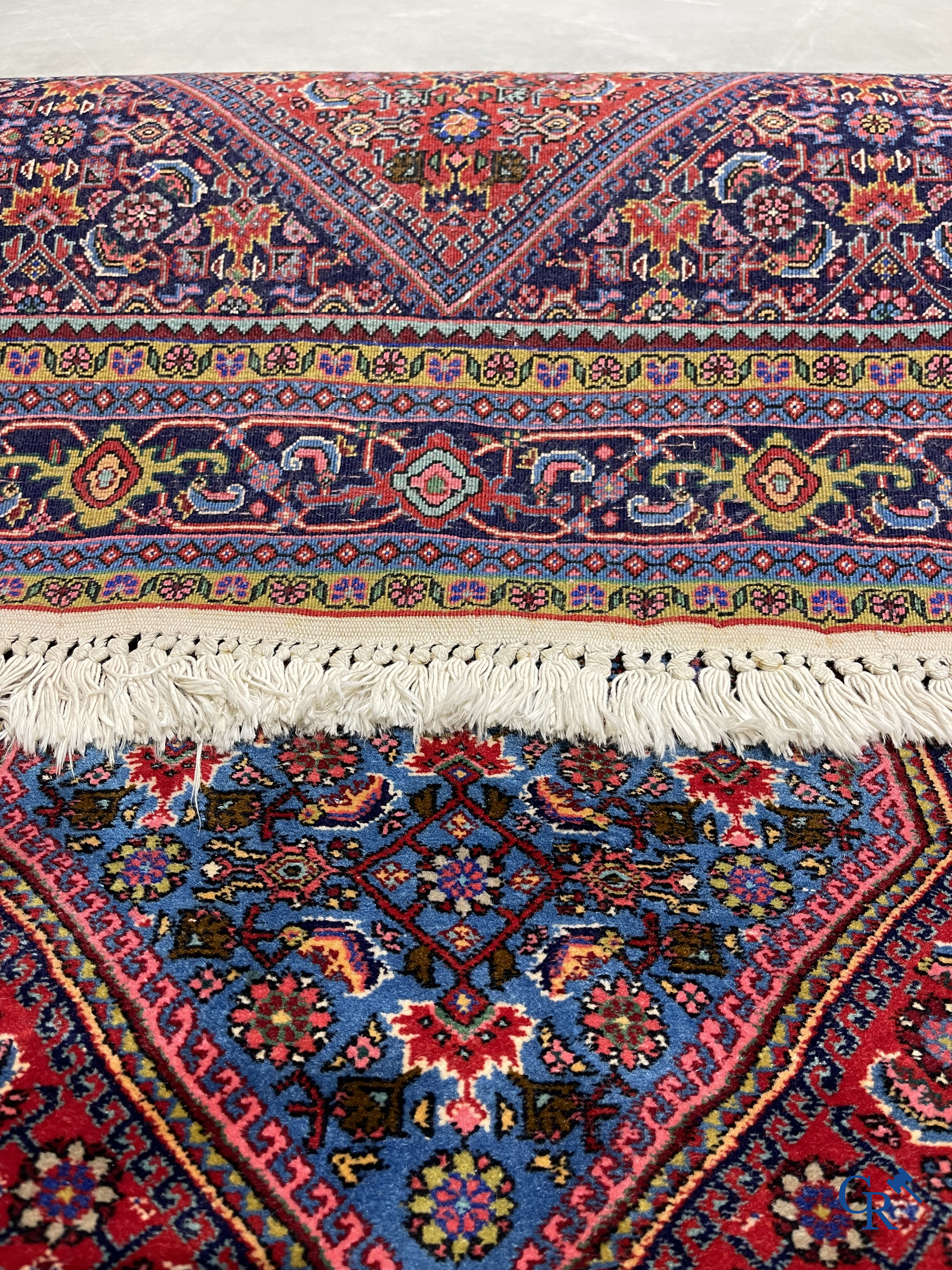 Oosterse tapijten. 2 handgeknoopte tapijten in wol.