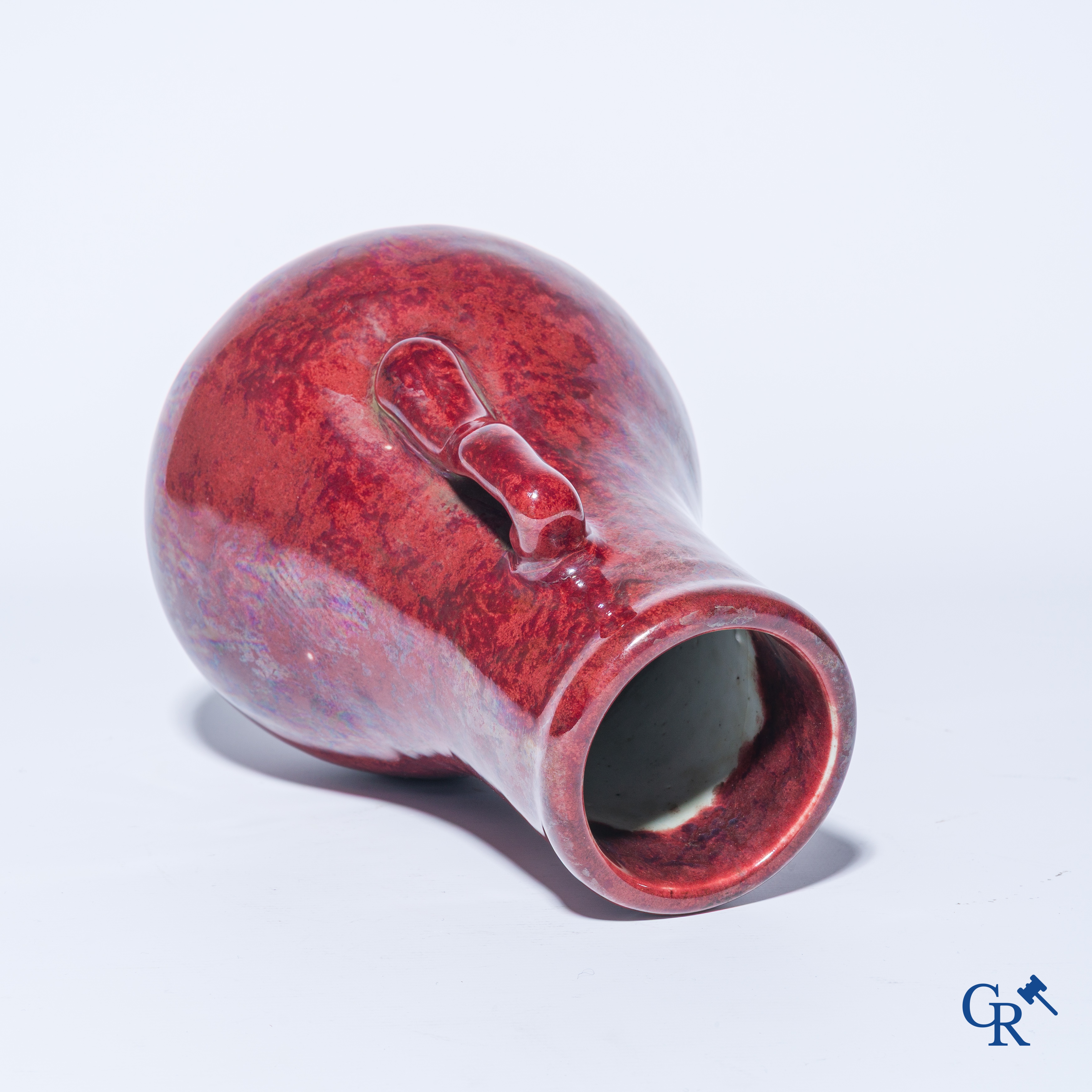 Asian Art. A Chinese porcelain Sang de boeuf vase. 19th century.