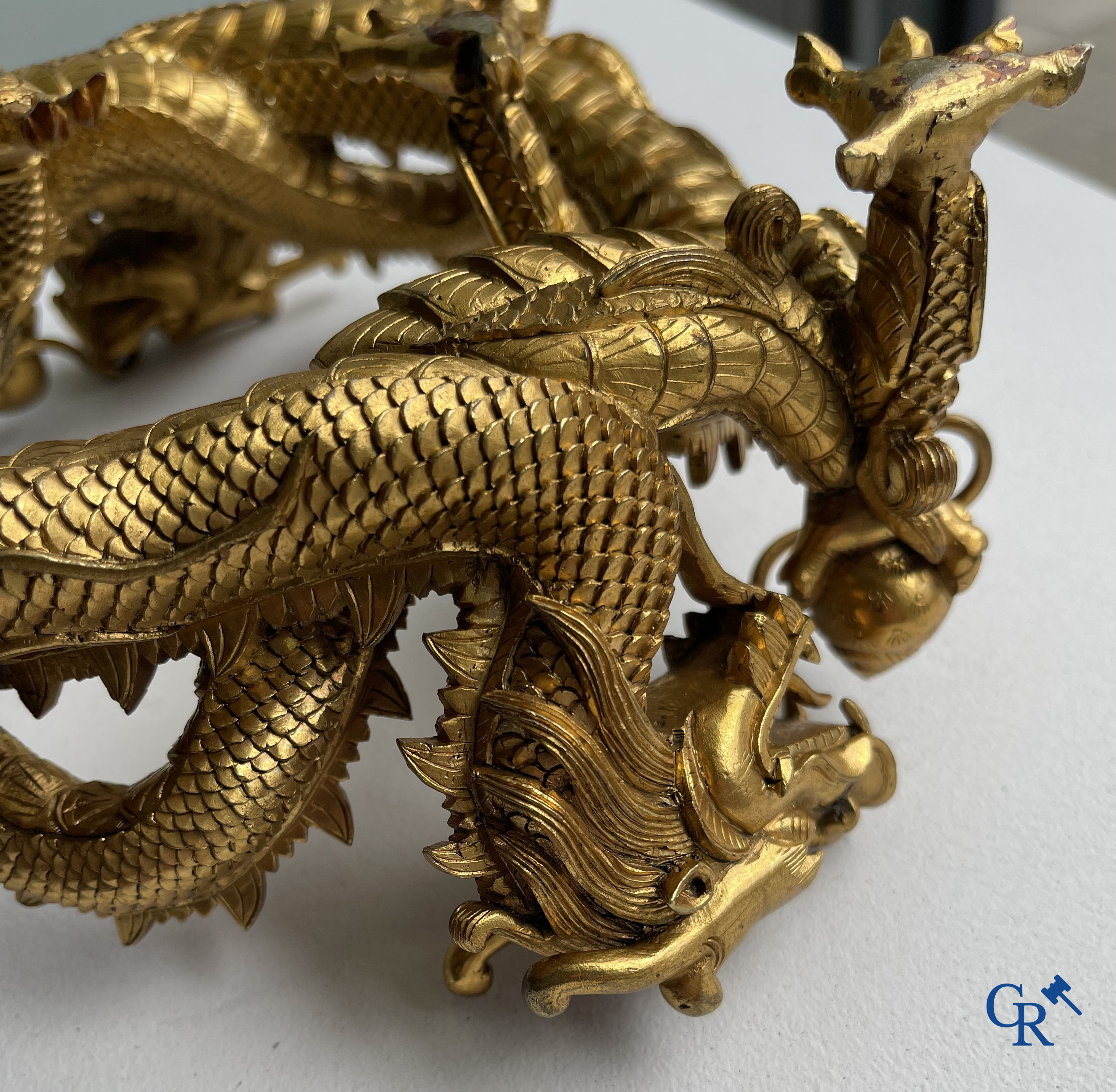 Asian Art. China. A rare Chinese gilt-bronze dragon stand. Qing Dynasty.