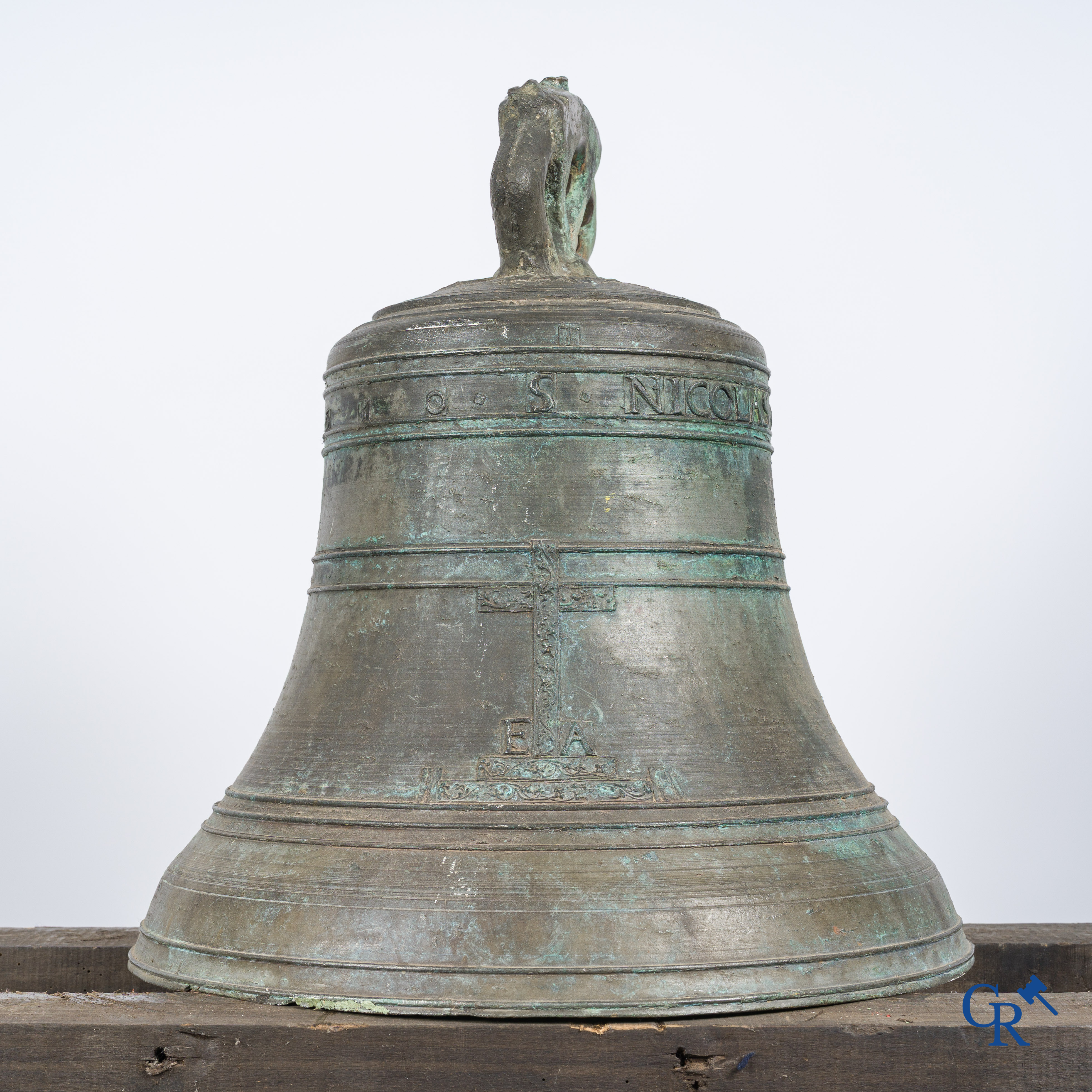 Religious objects. Large antique church crown clock or bell in bronze with inscription band. Dated 1650.