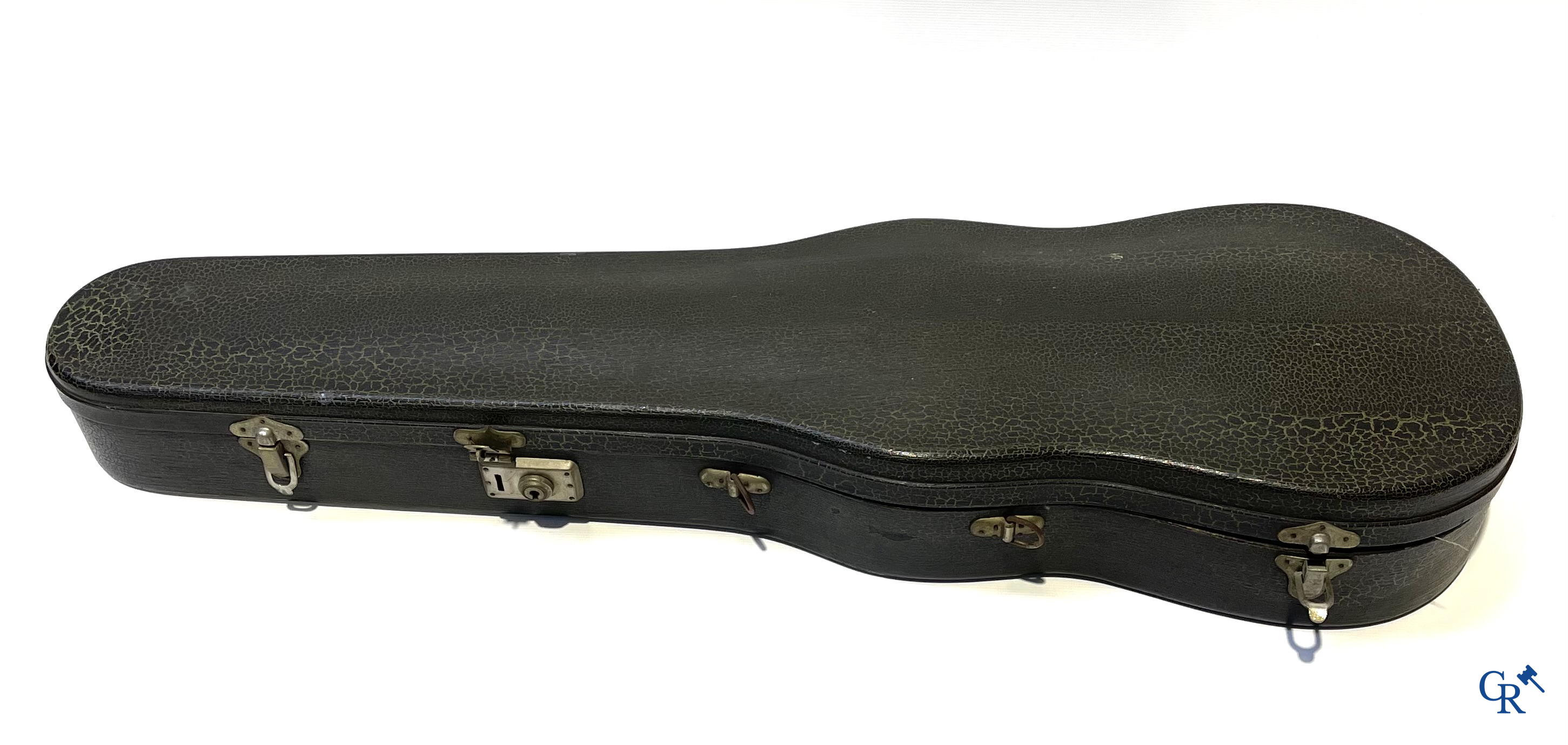 Antique violin with bow in storage case.