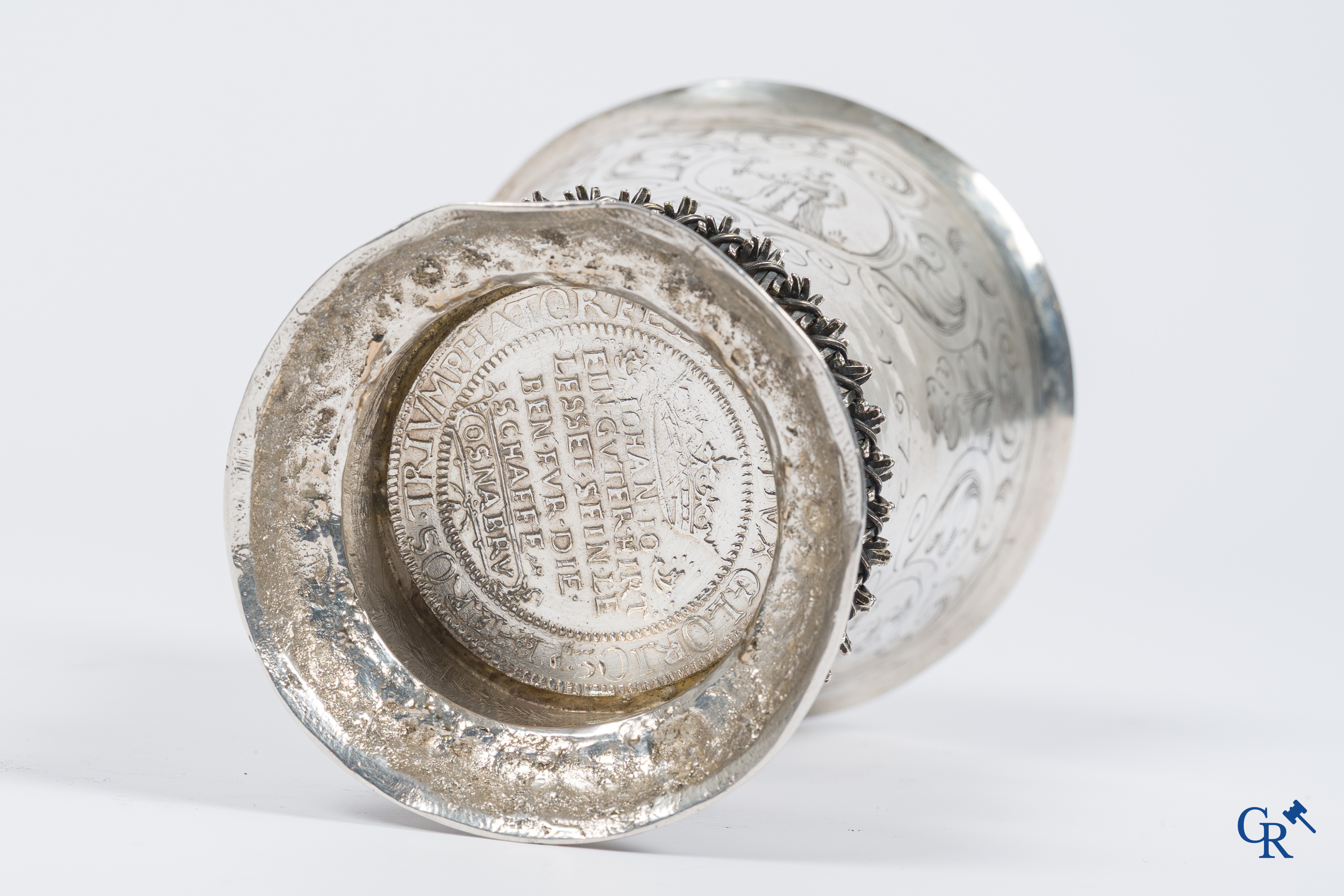 Holland, 17th century. Groningen cup in silver with Thaler of Osnabrück 1633 in the bottom. 