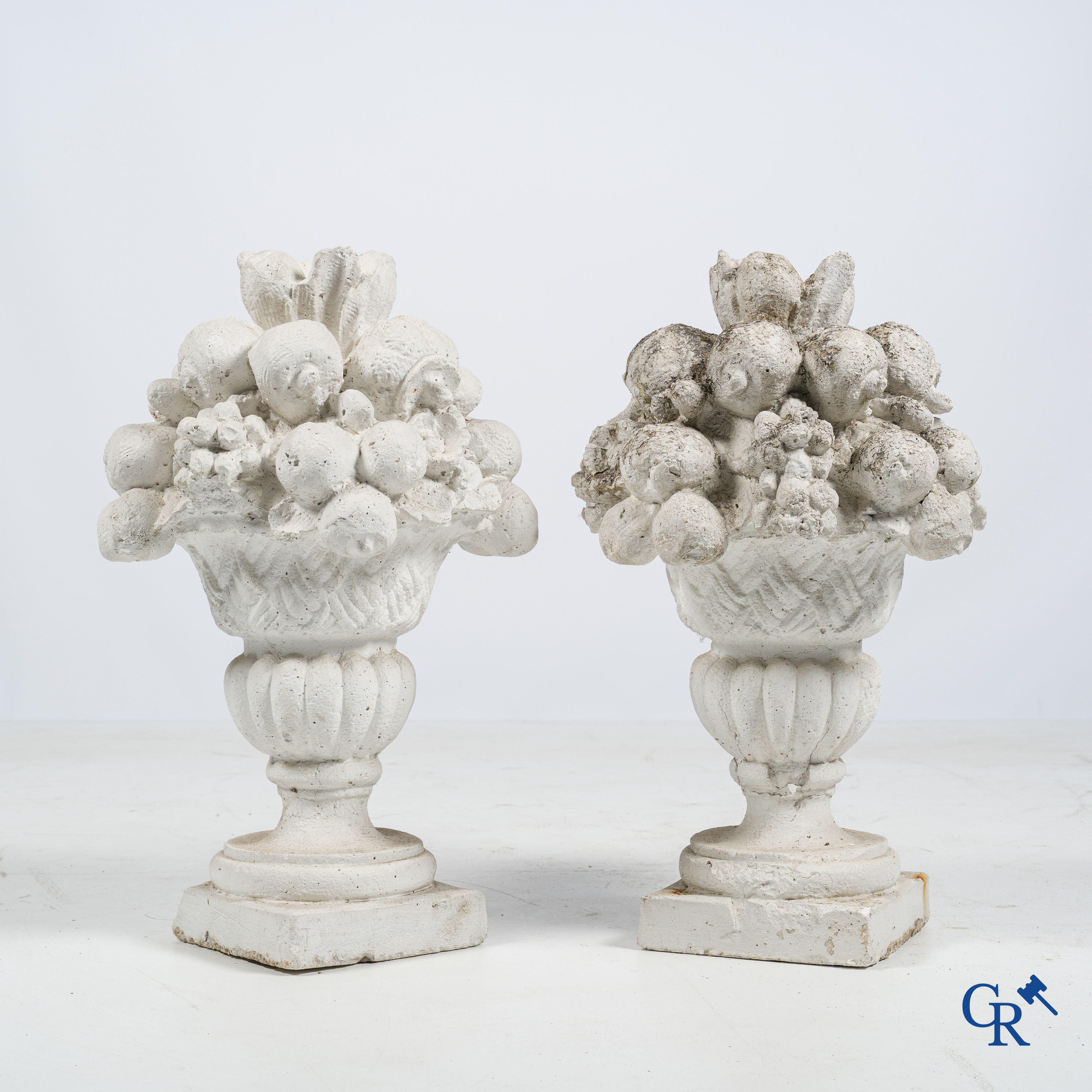 Garden decoration, a pair of stone garden ornaments.