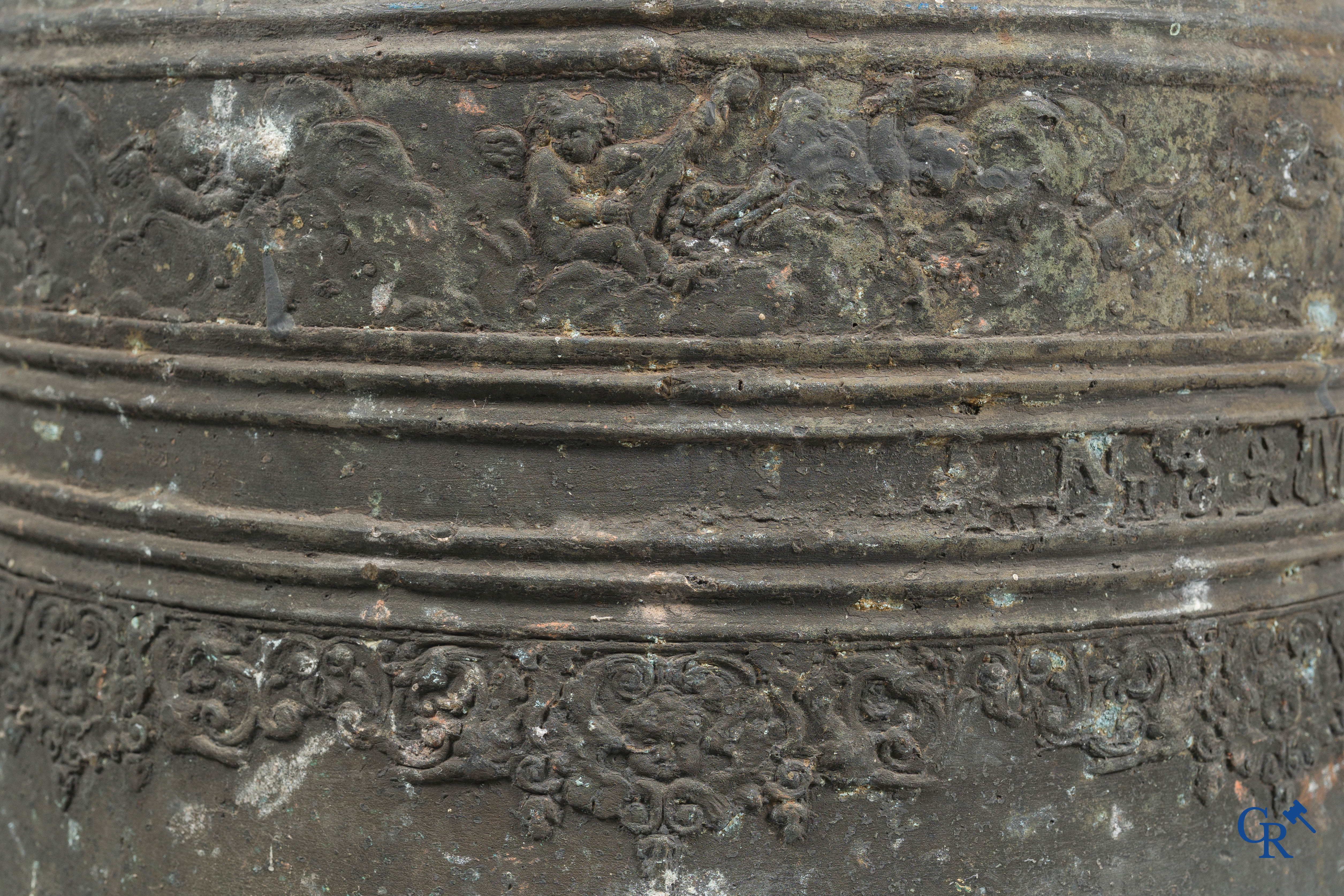Religious objects. Large bronze church crown bell. Inscription band with angel motifs.
