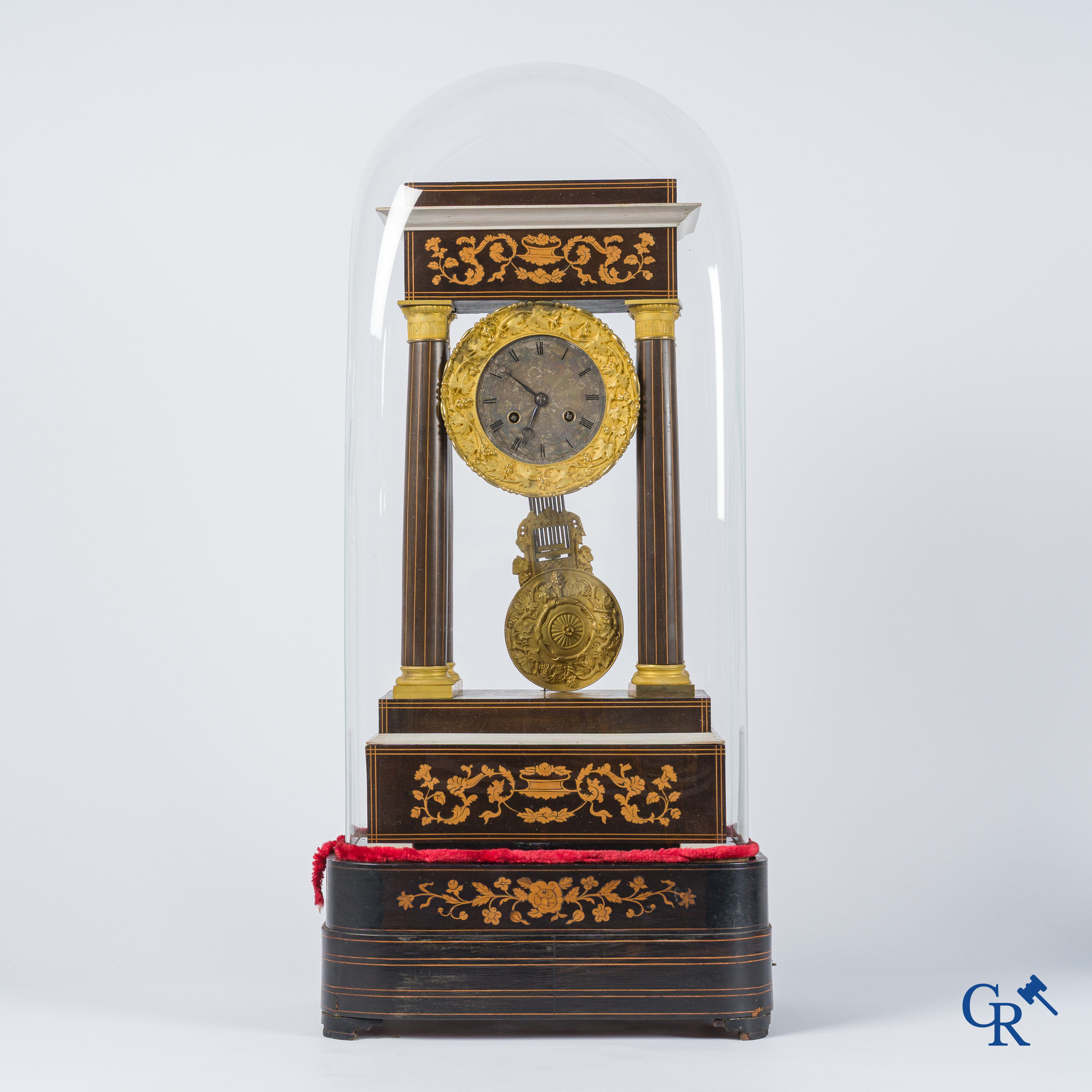Charles X column pendule in marquetry and bronze with music box. Matching globe. 19th century.