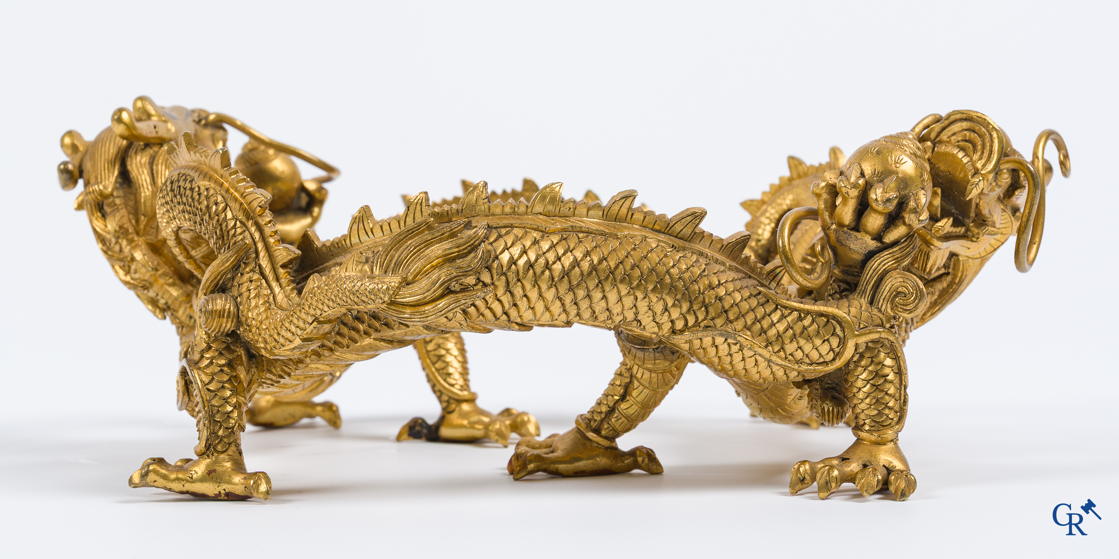 Asian Art. China. A rare Chinese gilt-bronze dragon stand. Qing Dynasty.