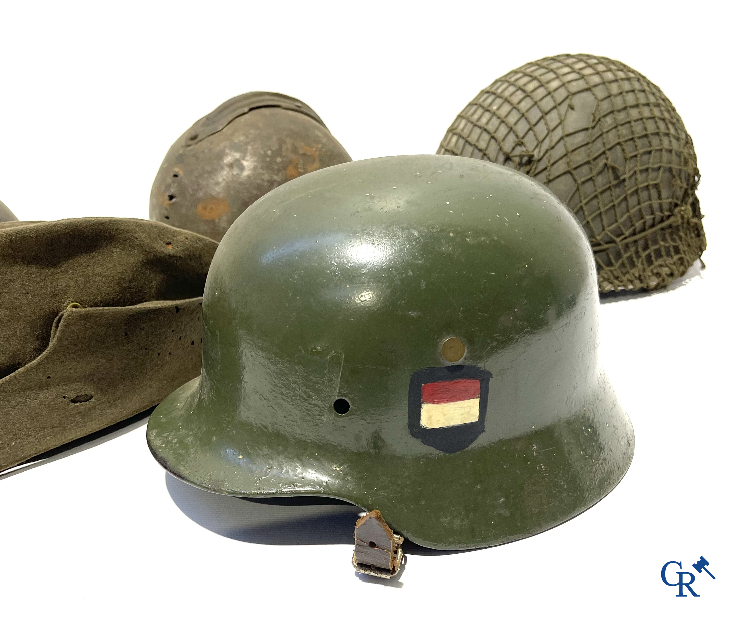 Militaria. Lot of 5 military headgear, some WWII including an officers cap from The Headline Hat Co., 1941.