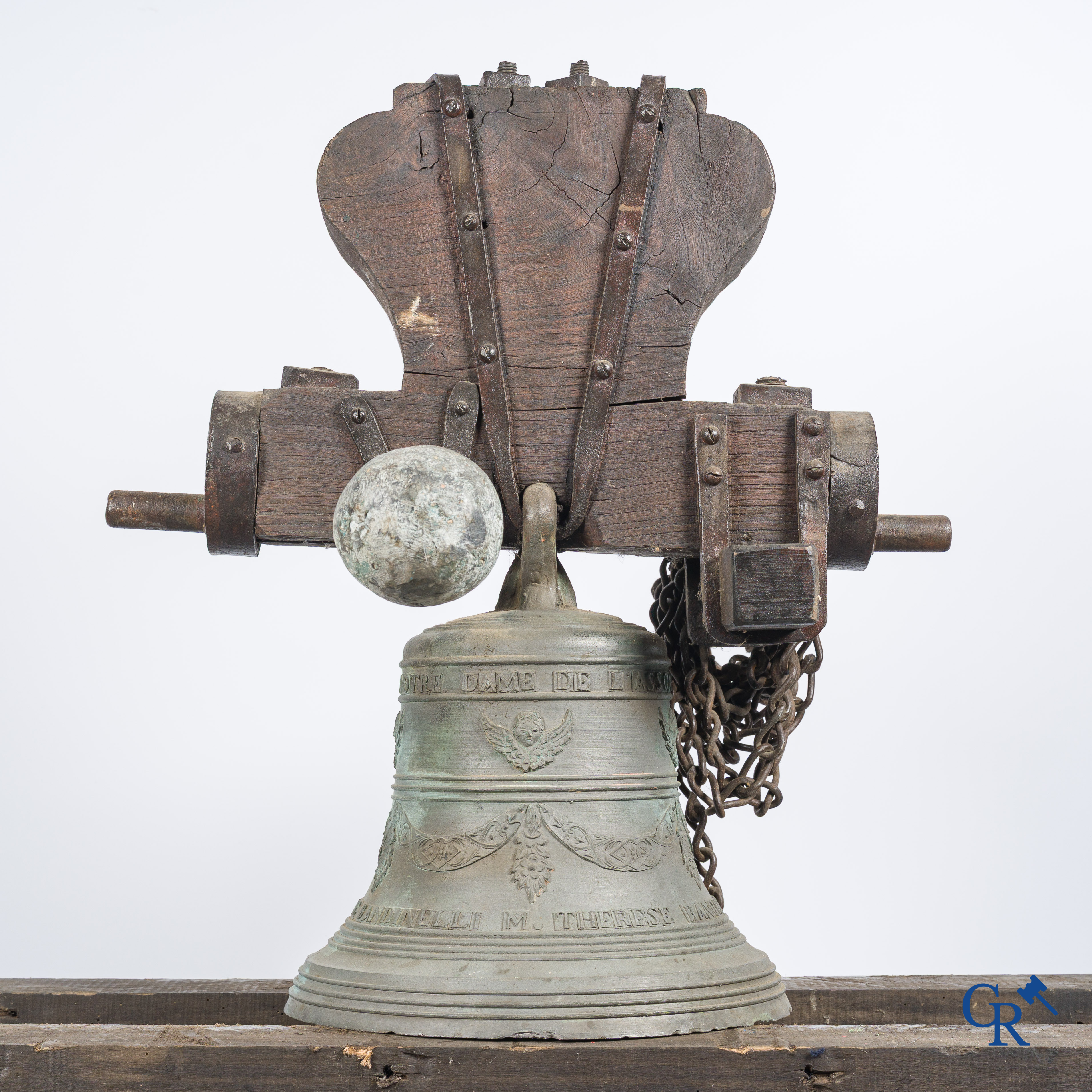 Large bronze bell with wooden yoke. Decorated with winged angels and garlands. Inscription band. Nice 1864.