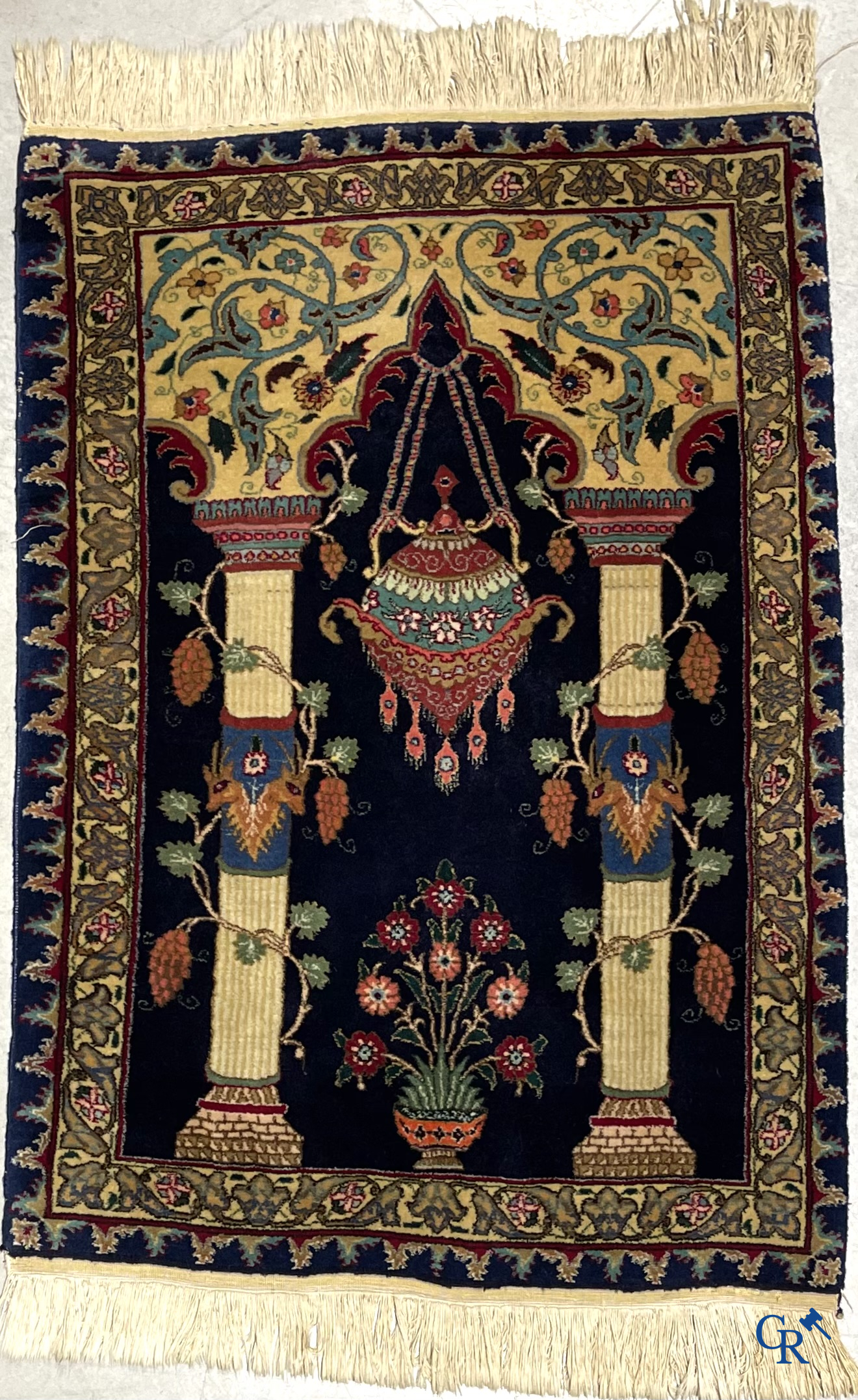 Oriental carpets. A wool prayer carpet.