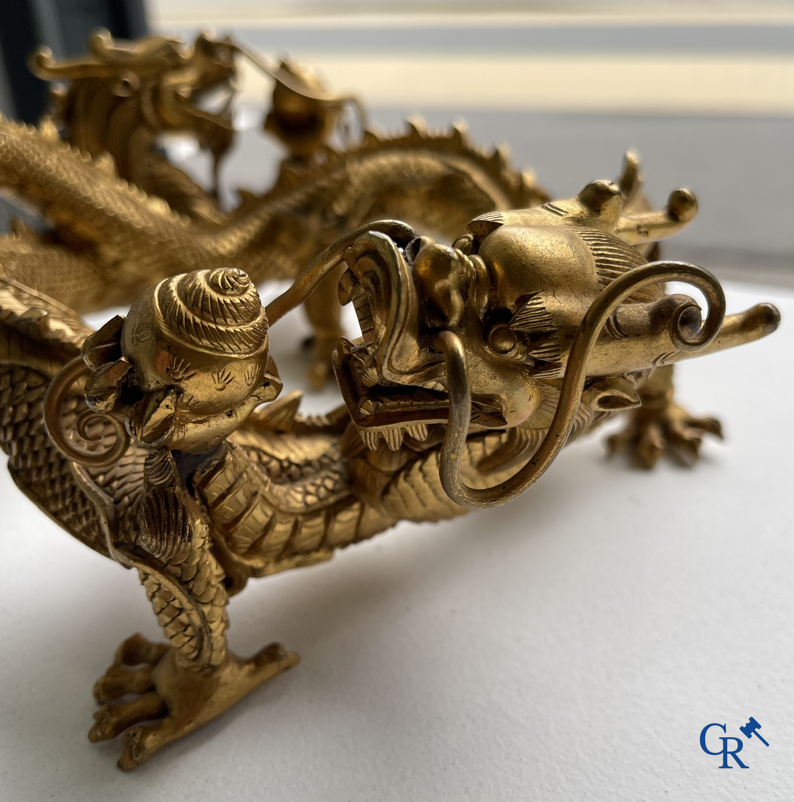 Asian Art. China. A rare Chinese gilt-bronze dragon stand. Qing Dynasty.