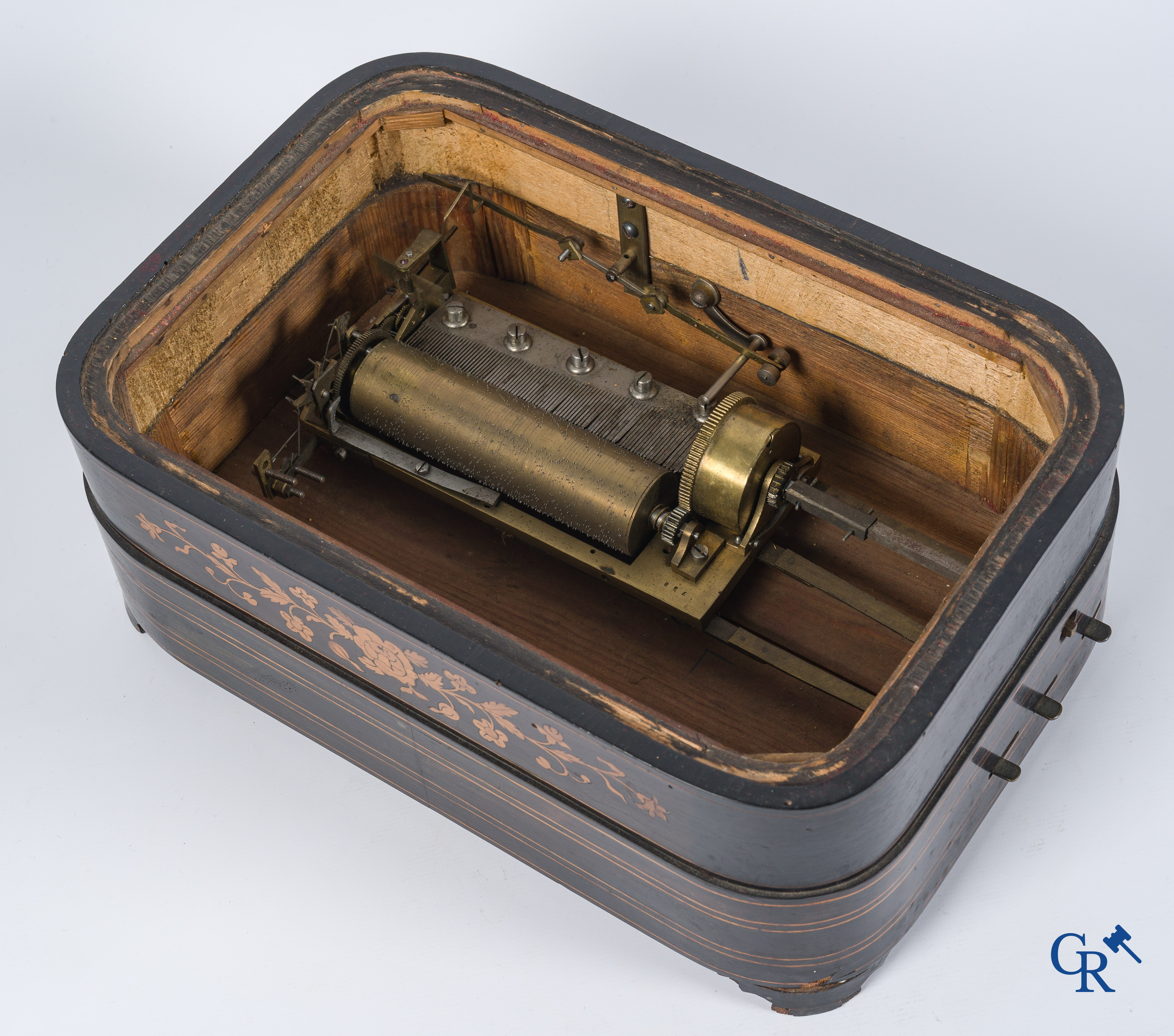 Charles X column pendule in marquetry and bronze with music box. Matching globe. 19th century.