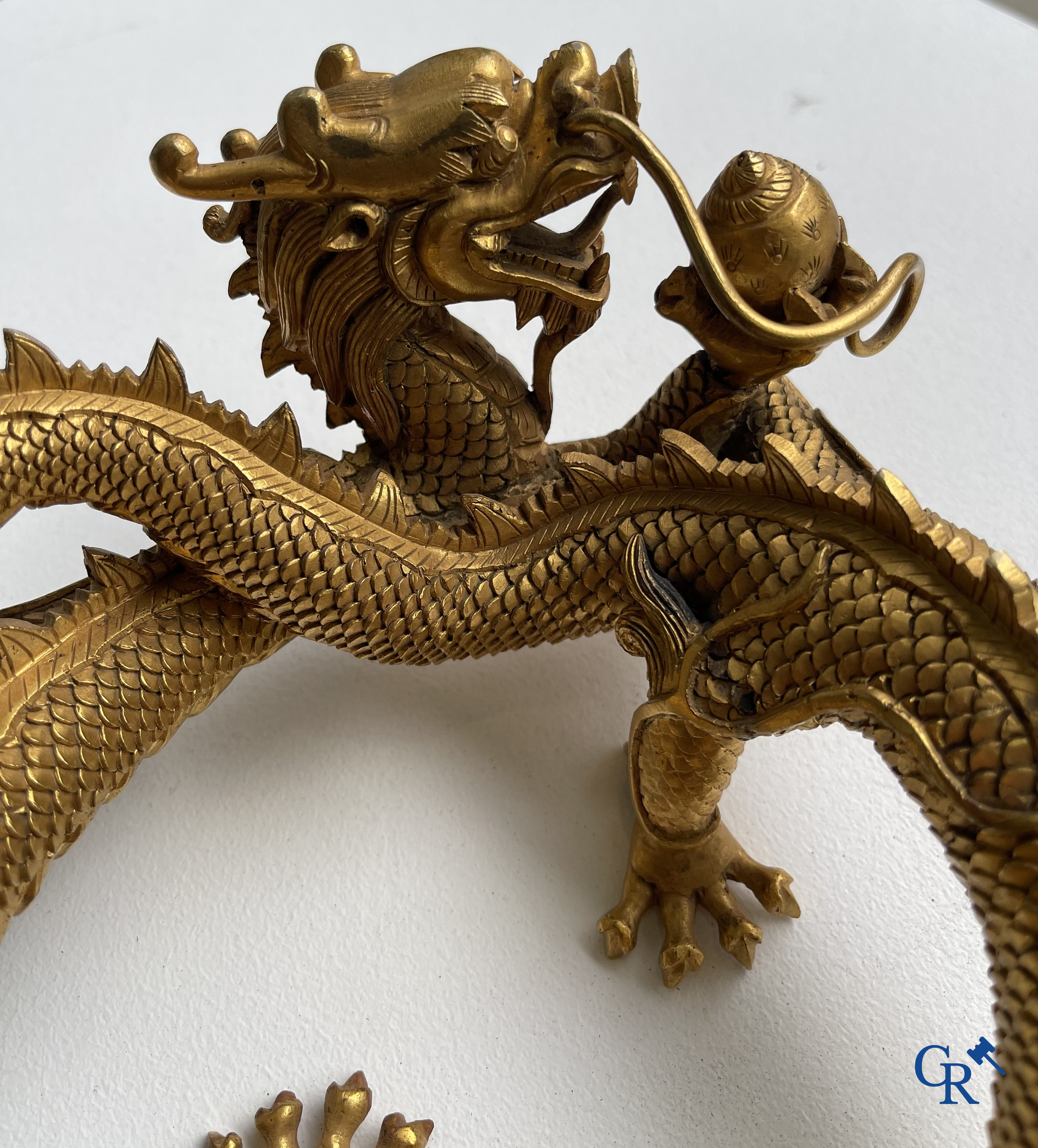 Asian Art. China. A rare Chinese gilt-bronze dragon stand. Qing Dynasty.