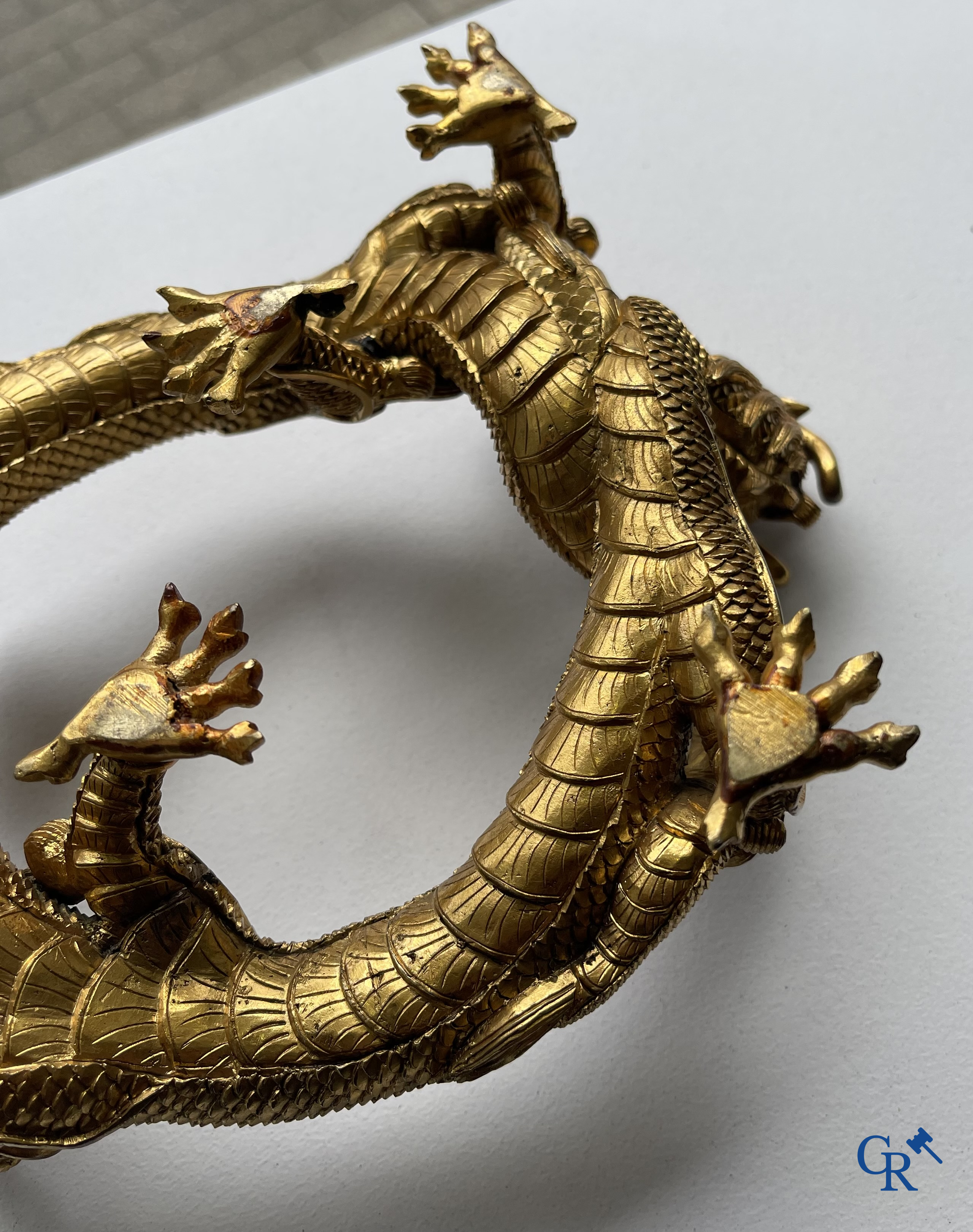 Asian Art. China. A rare Chinese gilt-bronze dragon stand. Qing Dynasty.