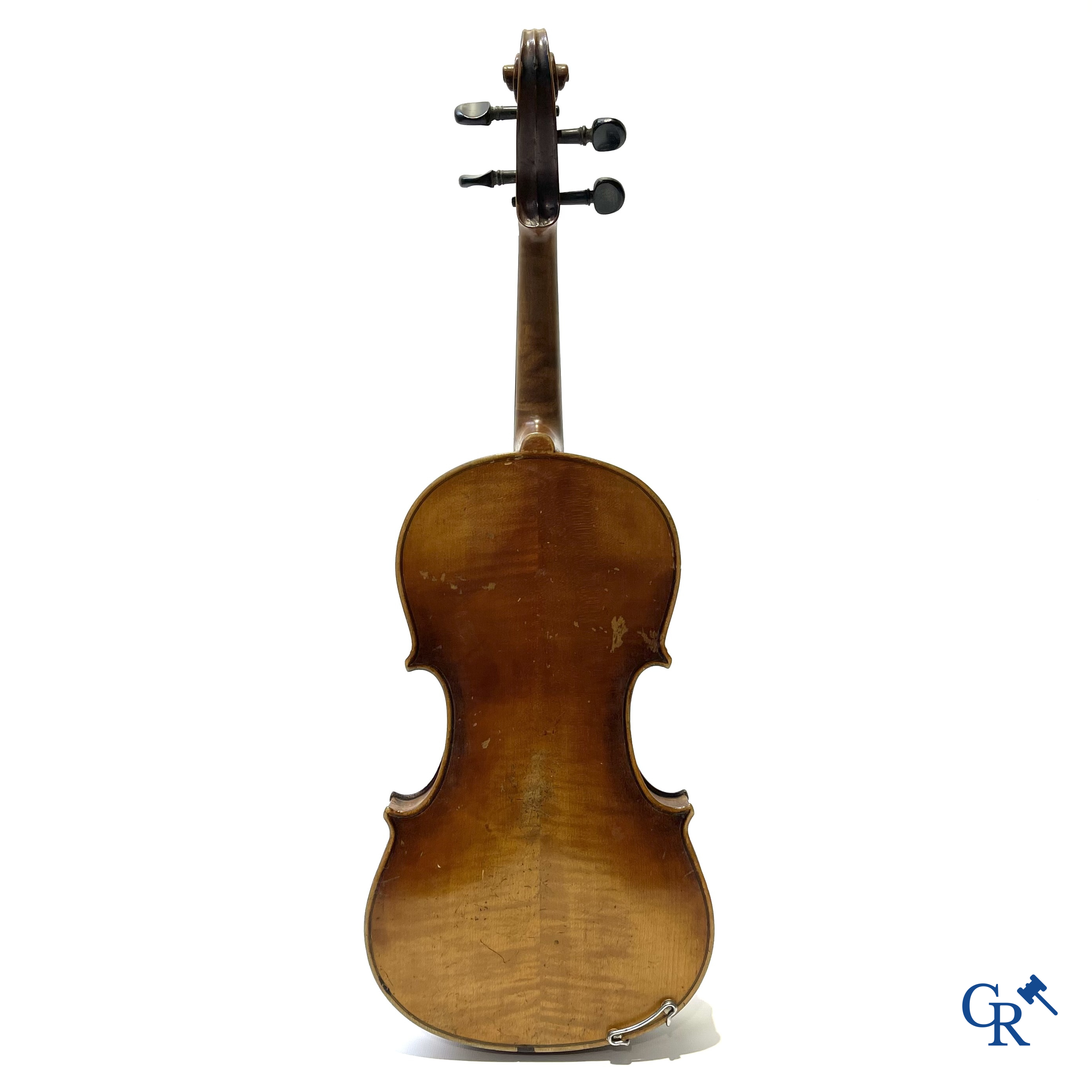 Antique violin with bow in storage case.