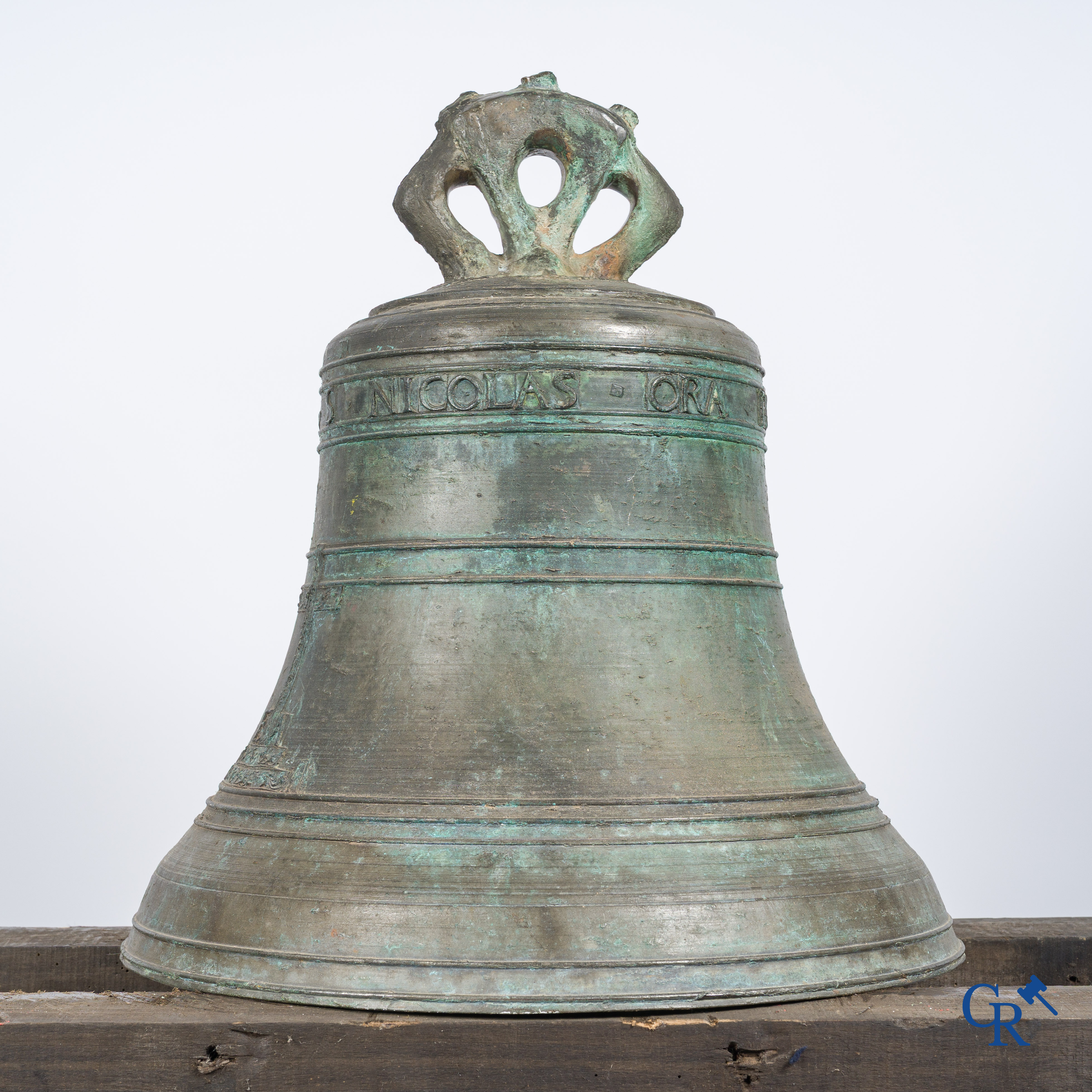 Religious objects. Large antique church crown clock or bell in bronze with inscription band. Dated 1650.