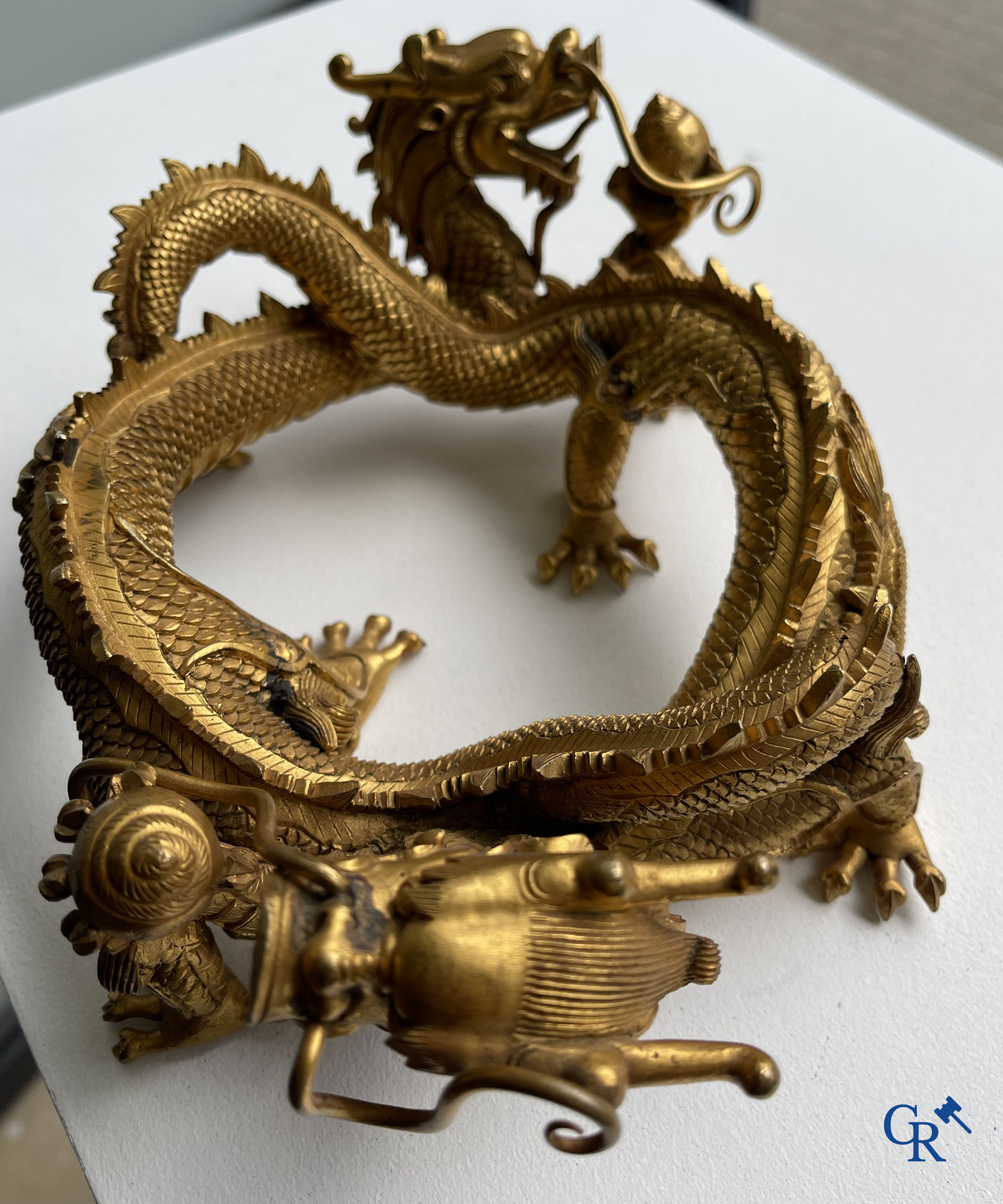 Asian Art. China. A rare Chinese gilt-bronze dragon stand. Qing Dynasty.
