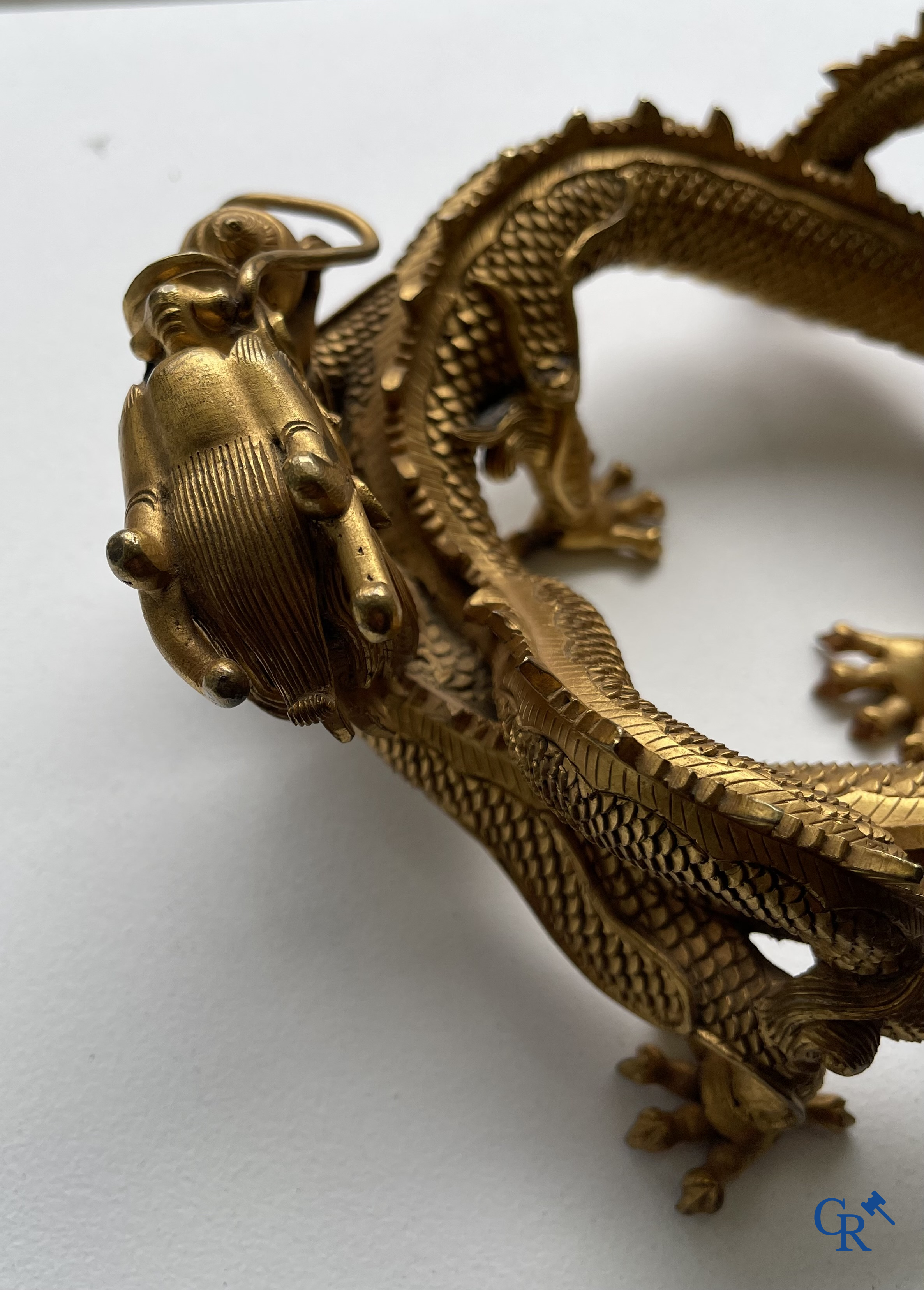 Asian Art. China. A rare Chinese gilt-bronze dragon stand. Qing Dynasty.