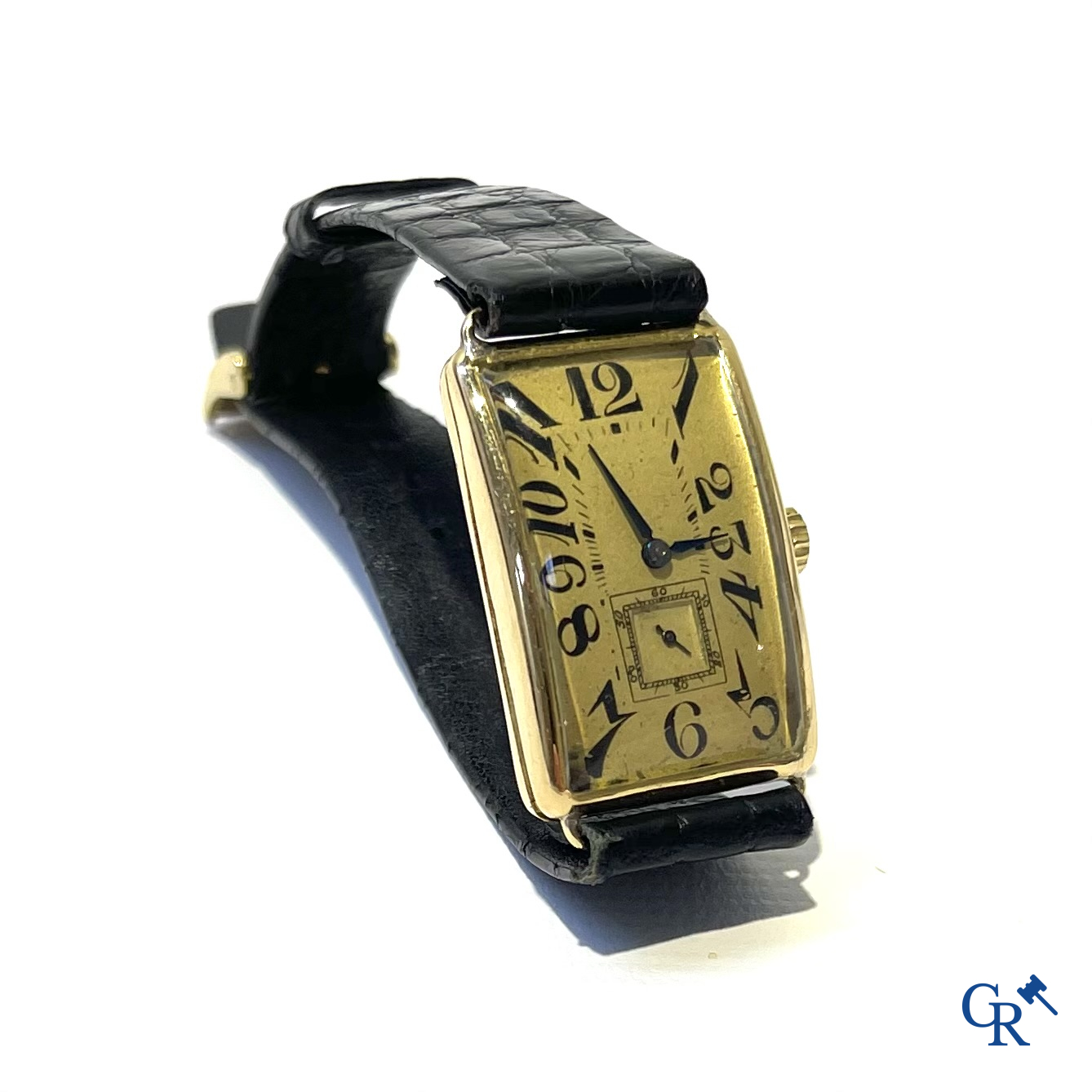 Heren polshorloge in geelgoud 750°/00. Genummerd 733459.